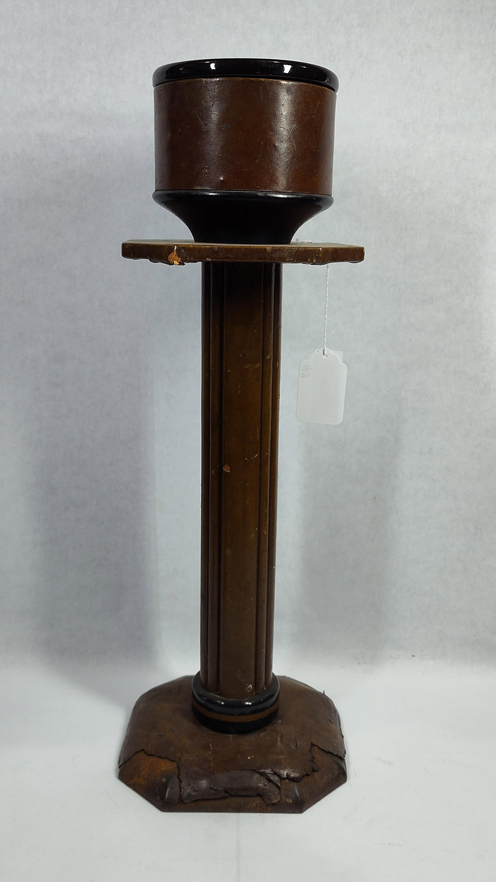 Art Deco Molded Composite Smoker's Stand with Removable Insert and Fluted Column: This Art Deco smoker's stand features a fluted central column rising from a weighted, stepped octagonal base. The stand is constructed from a molded composite material, possibly an early resin or plas