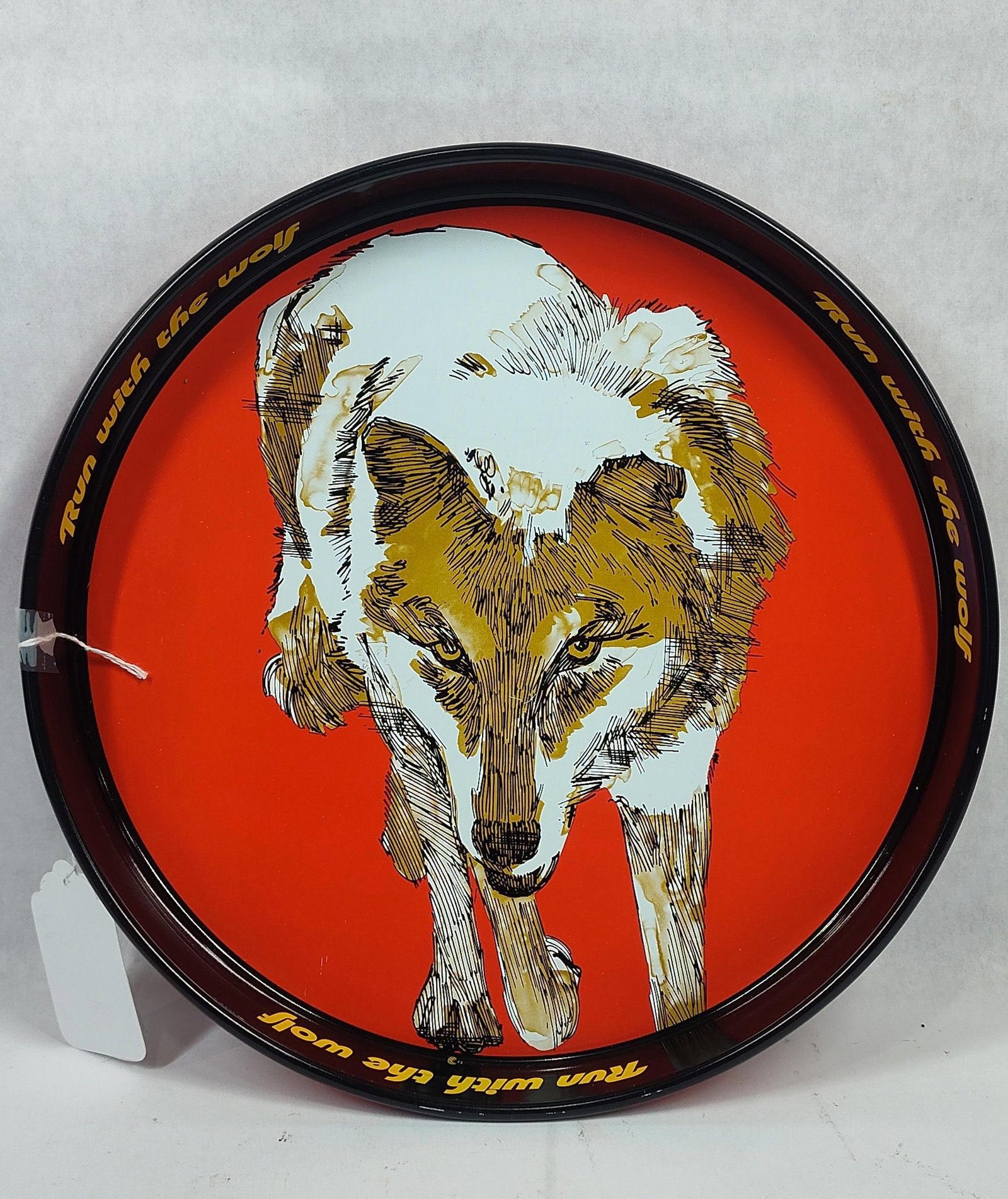 A Set of Four1970s Wolfschmidt Vodka Run with the Wolf Lithographed Metal Bar Trays (1 of 3)