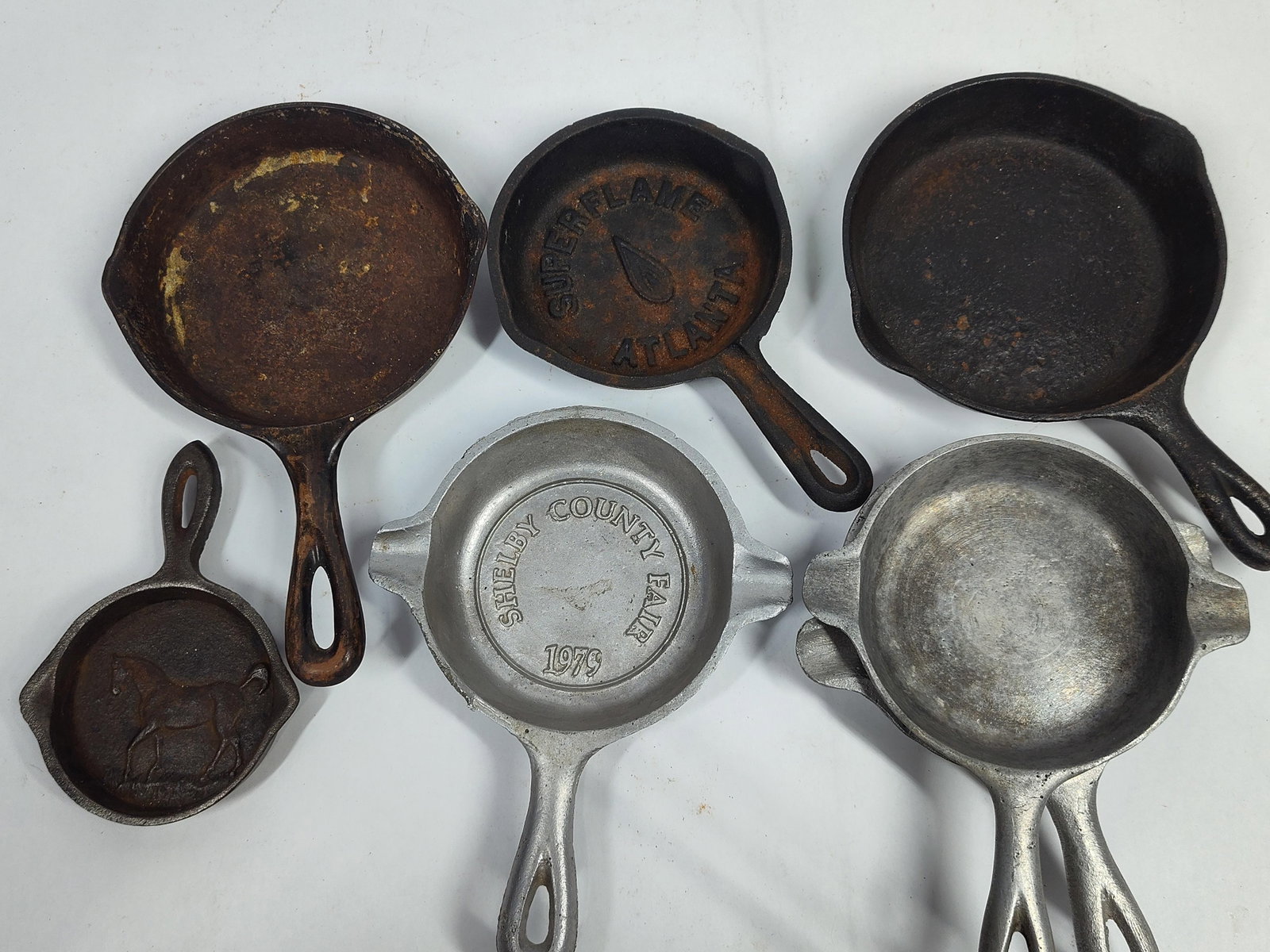 An Assortment ofMiniature Advertising and Novelty Skillets and Ashtrays (1 of 9)