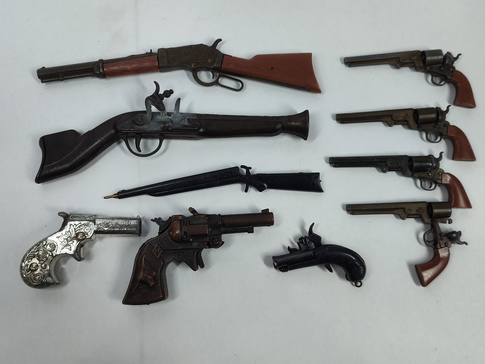 Collection of ElevenDie-Cast and Plastic Toy Firearms and Novelty Items including Hubley (1 of 4)