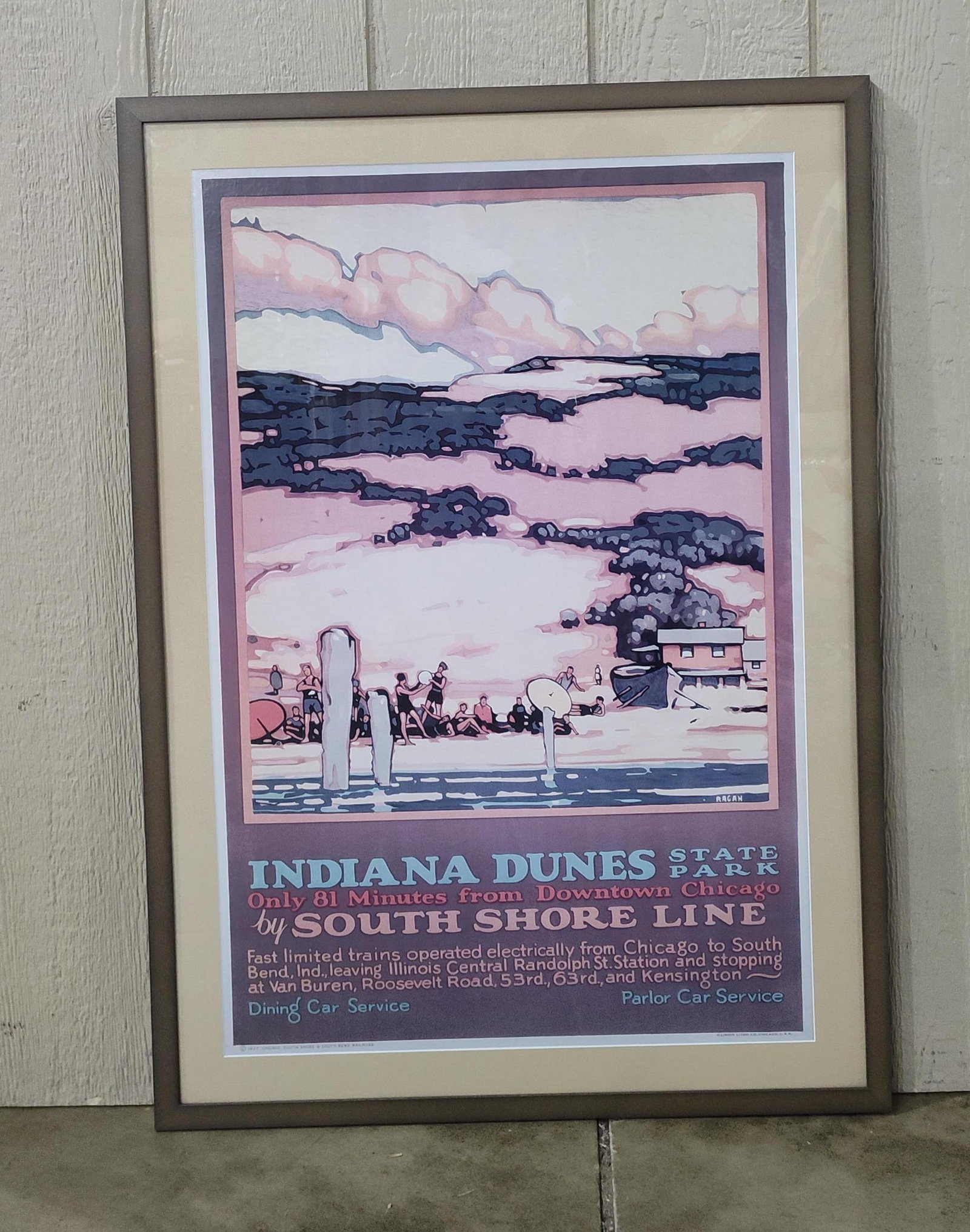 Leslie Ragan, Indiana Dunes State Park, South Shore Line Travel Poster, 1927 (Signed): This lot features a travel poster for Indiana Dunes State Park, promoting the South Shore Line railroad. The work is based on an original 1927 design by artist Leslie Ragan. The composition utilizes a