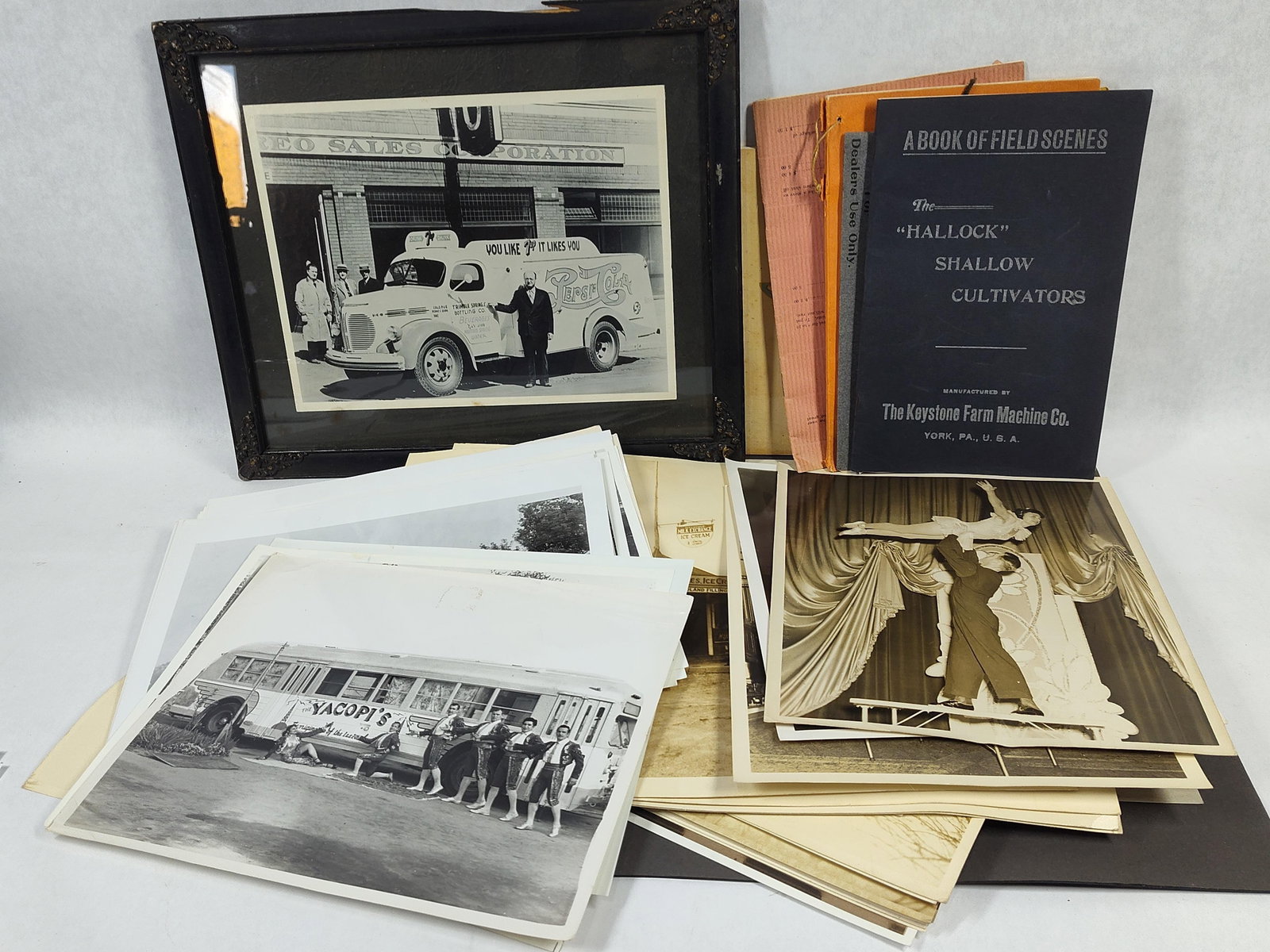 An Assortment ofEphemera Including Framed 7-Up and Pepsi-Cola Delivery Truck Photograph and Trade: This collection of early to mid-20th-century American ephemera is centered around a large-format framed black and white promotional photograph. The image depicts a streamlined commercial delivery truc
