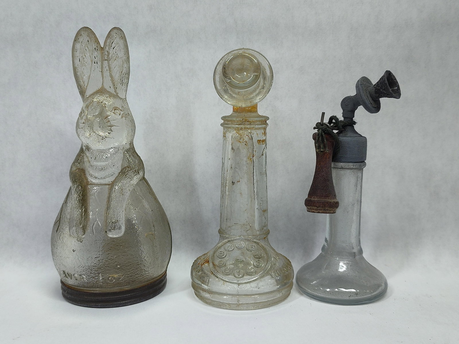 A Trio ofClear Glass Figural Candy Containers and Bottle (1 of 5)