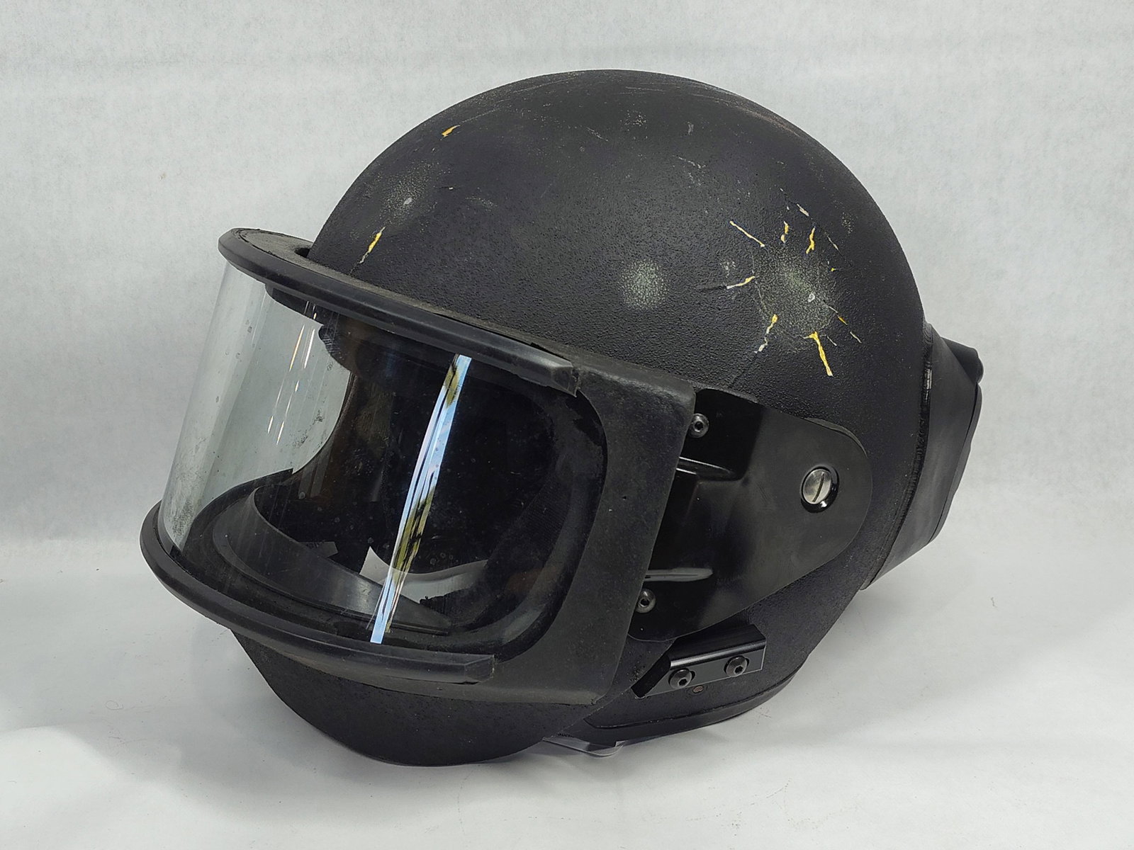 Ballistic EOD Helmet in the Style of NP Aerospace Elite Series: A professional-grade ballistic helmet designed for Explosive Ordnance Disposal or specialized tactical search operations. The item features a composite shell with a textured matte black finish. It is 