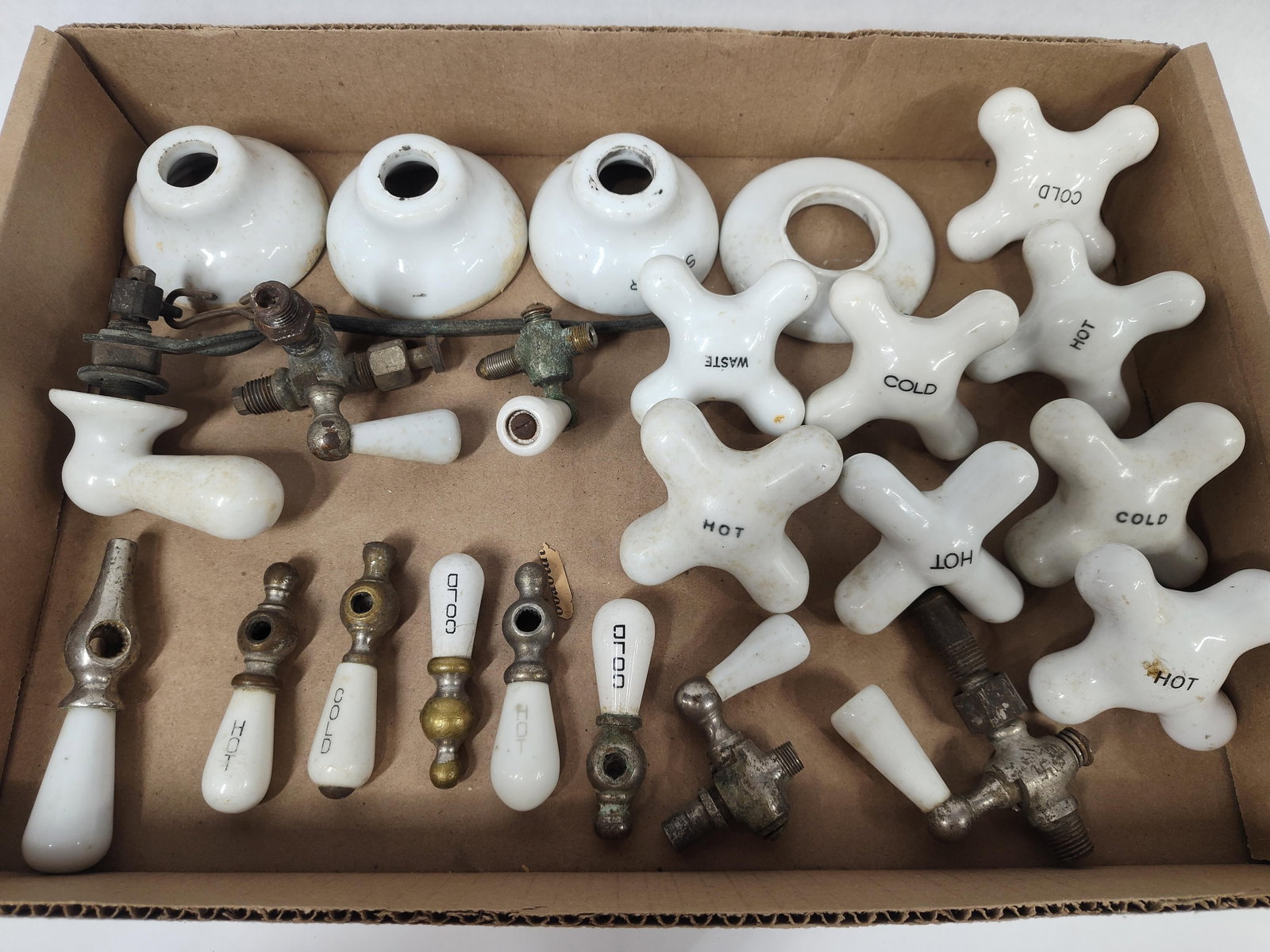 An Assortment of Antique andPorcelain and Metal Bathroom Plumbing Components (1 of 1)