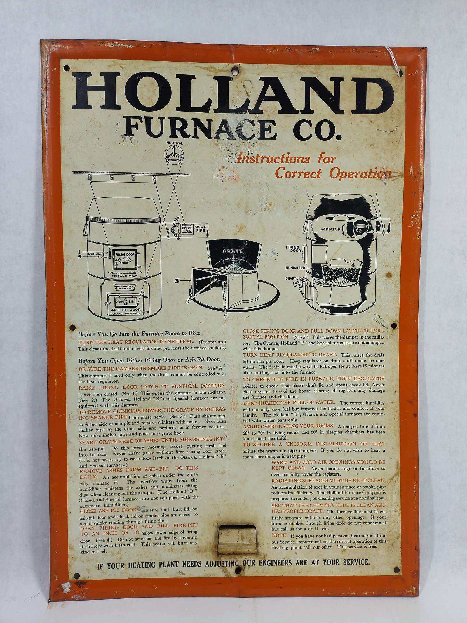 Holland Furnace Co. Tin Lithograph Instruction Sign Produced by Shonk Works: This is a rectangulartin lithograph instruction sign manufactured for the Holland Furnace Co. of Holland, Michigan. The sign is made of metal and features a prominent orange border surrounding a cream