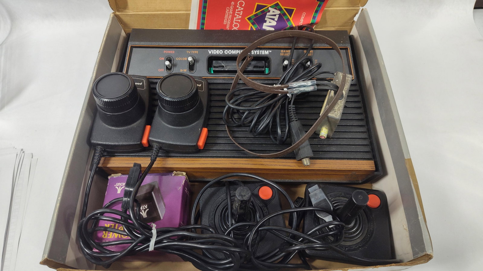 An Assortment of Atari 2600 Video Computer System CX2600 Four-Switch Console Equipment (1 of 6)