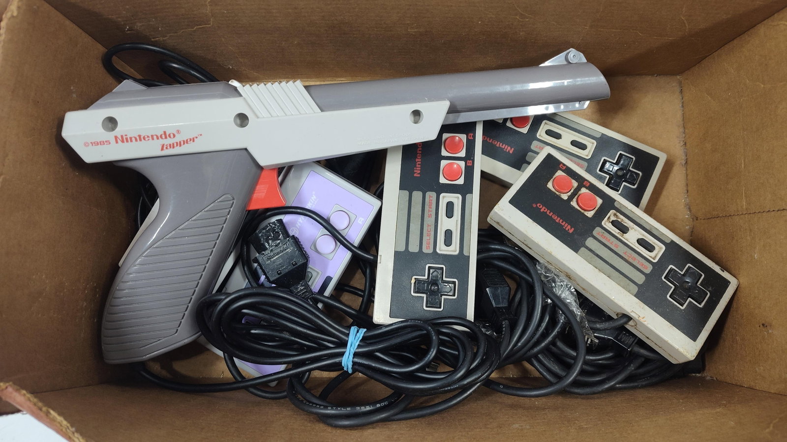 An Assortment of Six Nintendo Entertainment System Video Game Accessories Including Nintendo Zapper (1 of 2)