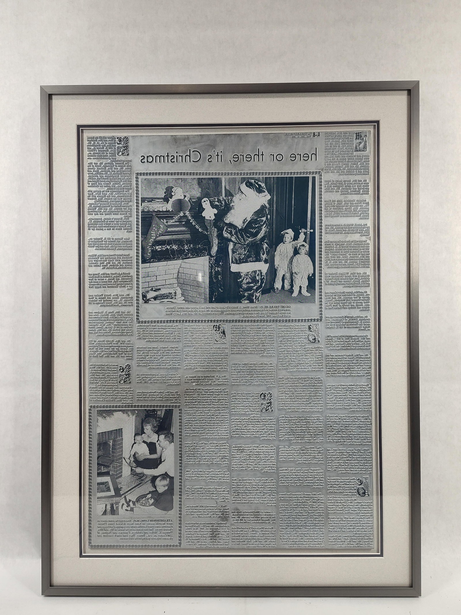 Framed Metallic Newspaper Page Reproduction of The Times-Reporter December 24 1969: This lot features a photographic reproduction of page 8-A from the December 24, 1969, edition of The Times-Reporter newspaper. The reproduction is printed in a reversed mirror image on a metallic-fini