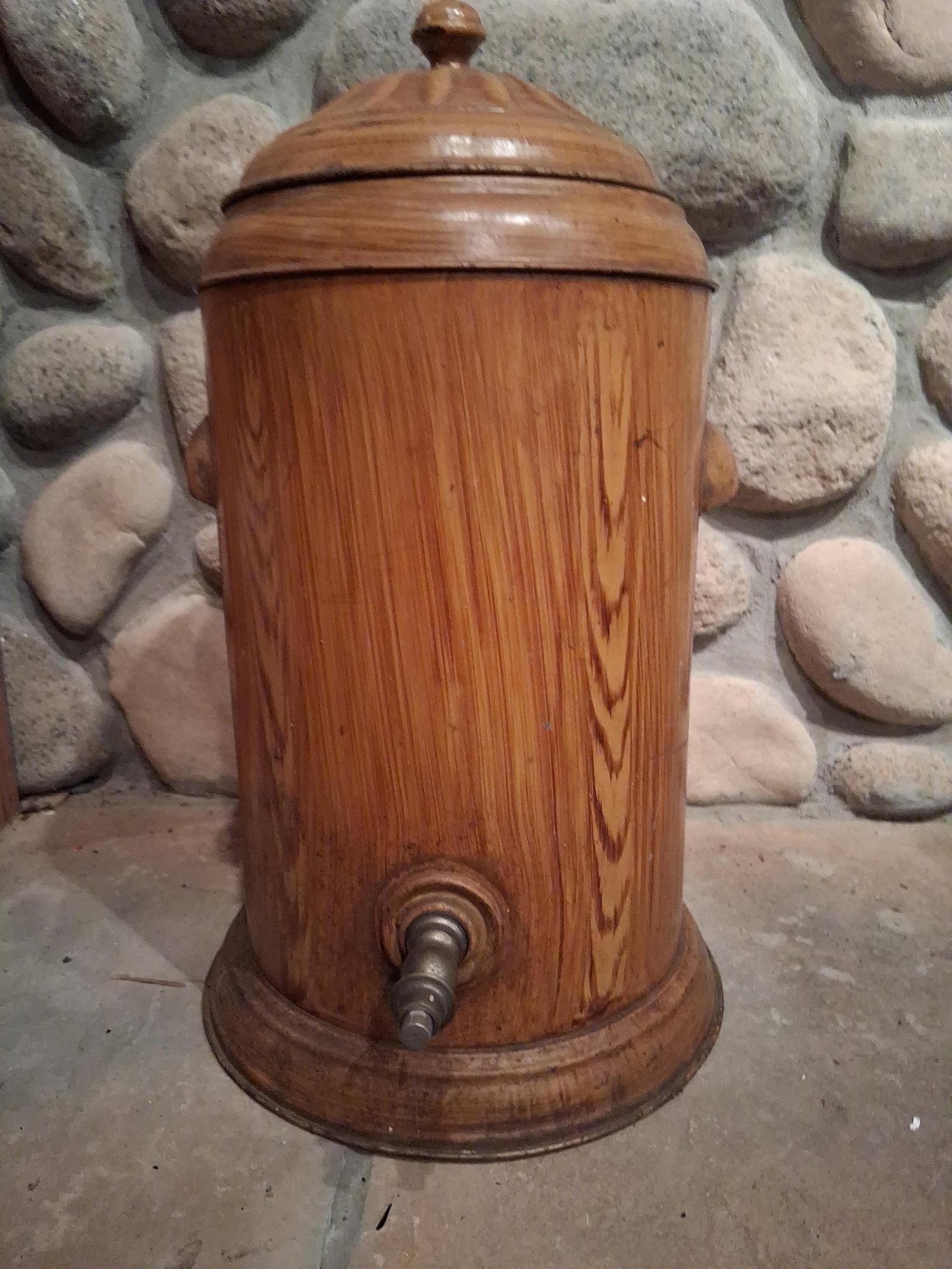 Antique Toleware Water Cooler w/ Faux Oak Grain: 40 inches tall. This antique cylindrical water cooler or beverage dispenser is constructed of metal and decorated with a hand-painted trompe l'oeil faux oak grain finish. The vessel features a matchin