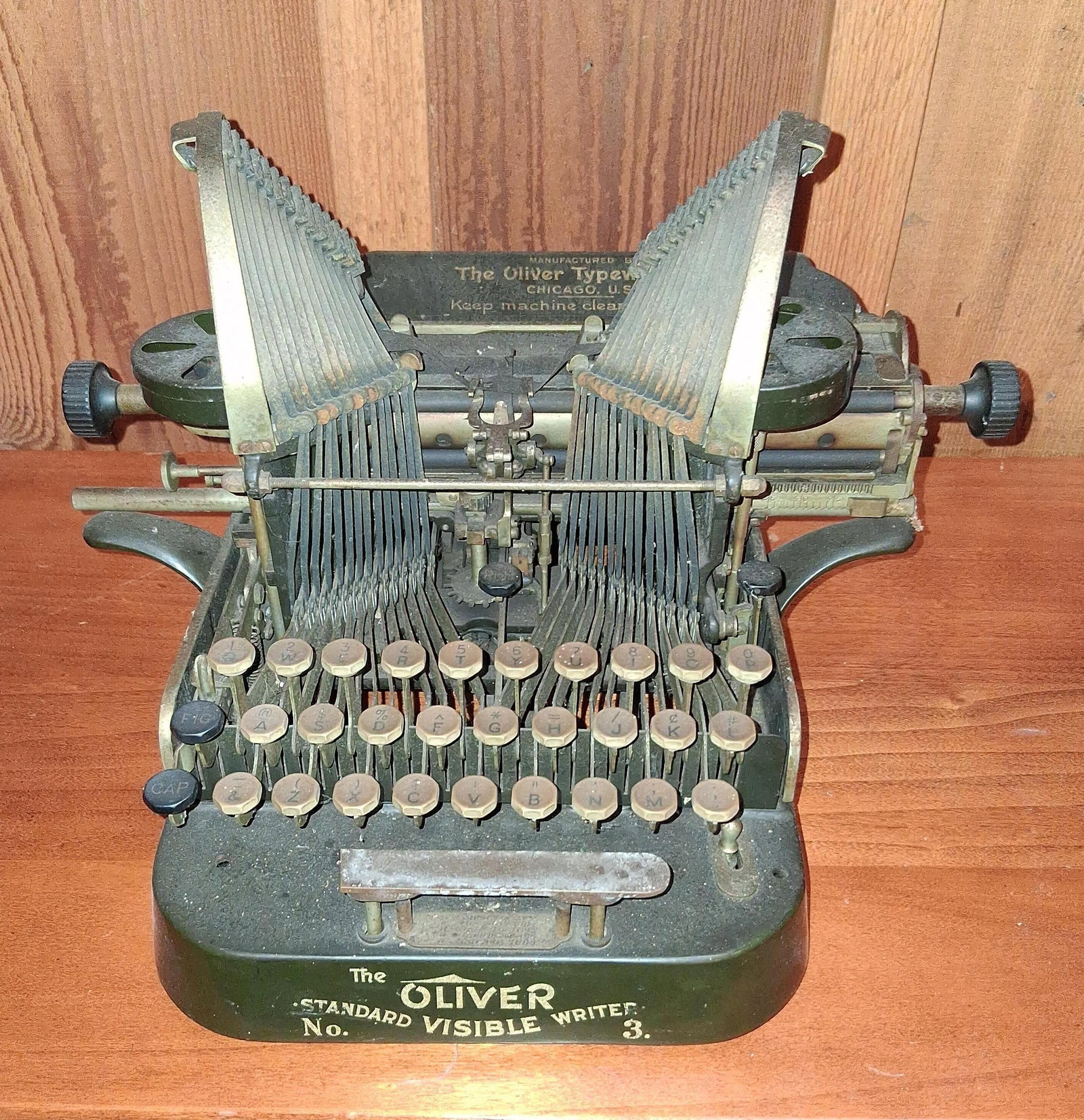 Oliver No. 3 Standard Visible Writer Typewriter: This is an early 20th-century Oliver No. 3 Standard Visible Writer typewriter, manufactured by The Oliver Typewriter Co. in Chicago, Illinois. It features the signature down-strike design with