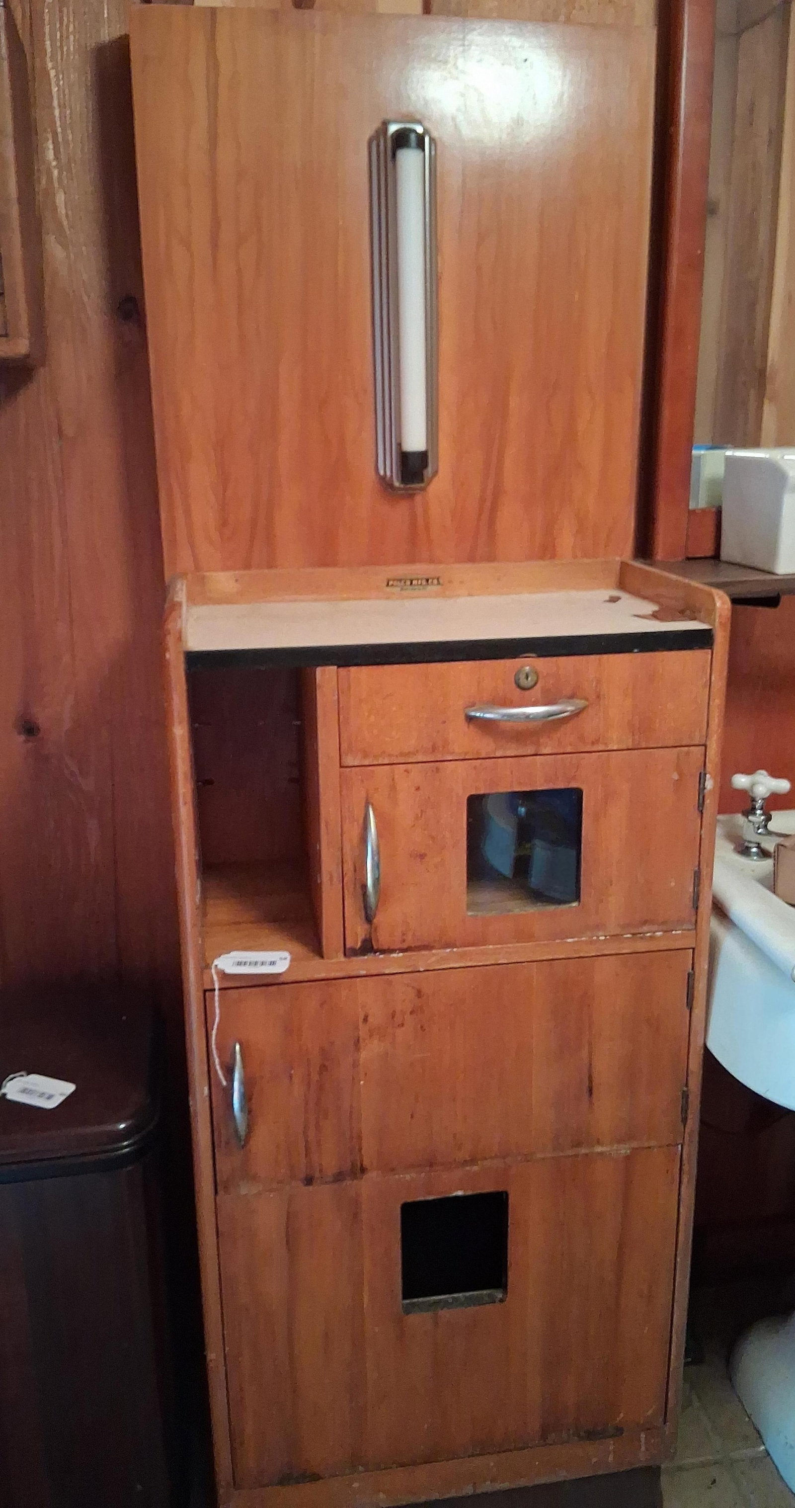 Palco Mfg. Co. Mid-Century Barber/Medical Cabinet: 21x13x65. This mid-century professional workstation was manufactured by the Palco Mfg. Co. of Belvidere, Illinois. The one-piece unit is constructed with a light-toned hardwood veneer, likely birch