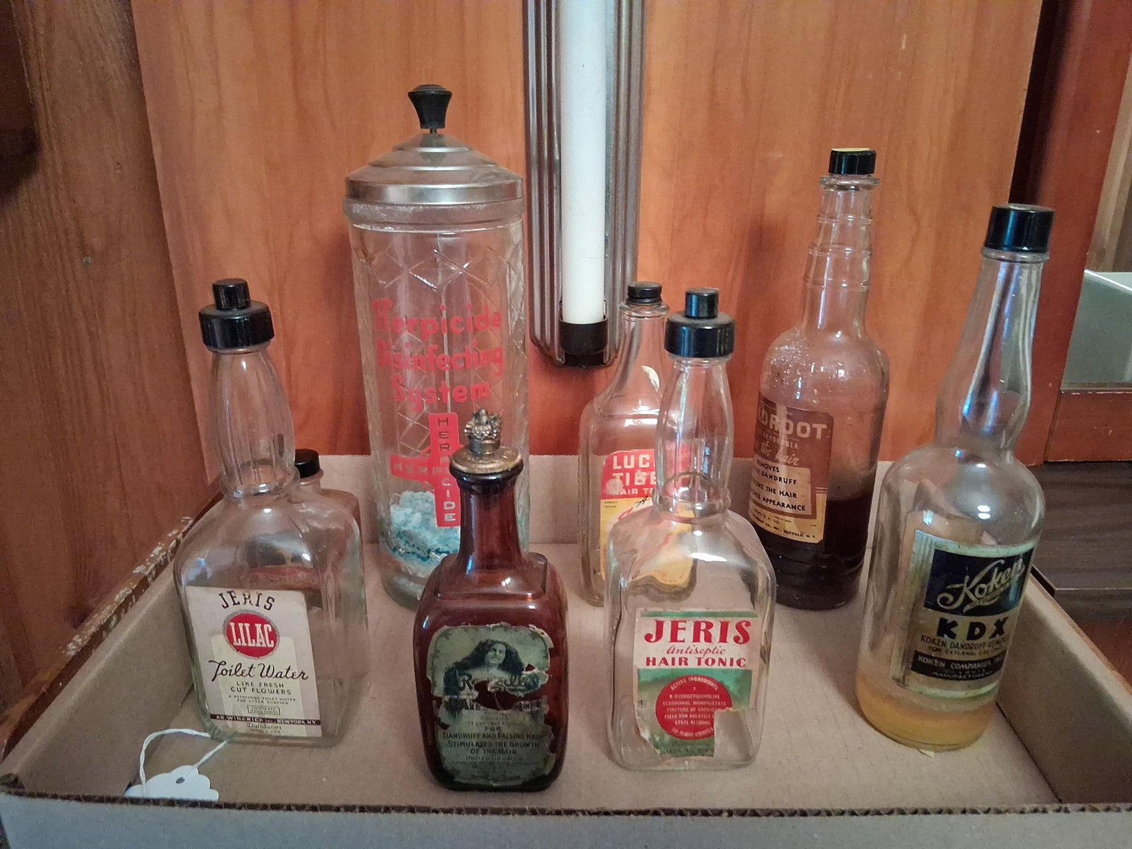 Vtg Barber Shop & Apothecary Bottles & Jars: This collection includes several vintage barber shop and apothecary items primarily dating from the mid-20th century. The centerpiece is a large clear glass Herpicide Disinfecting System jar with a me