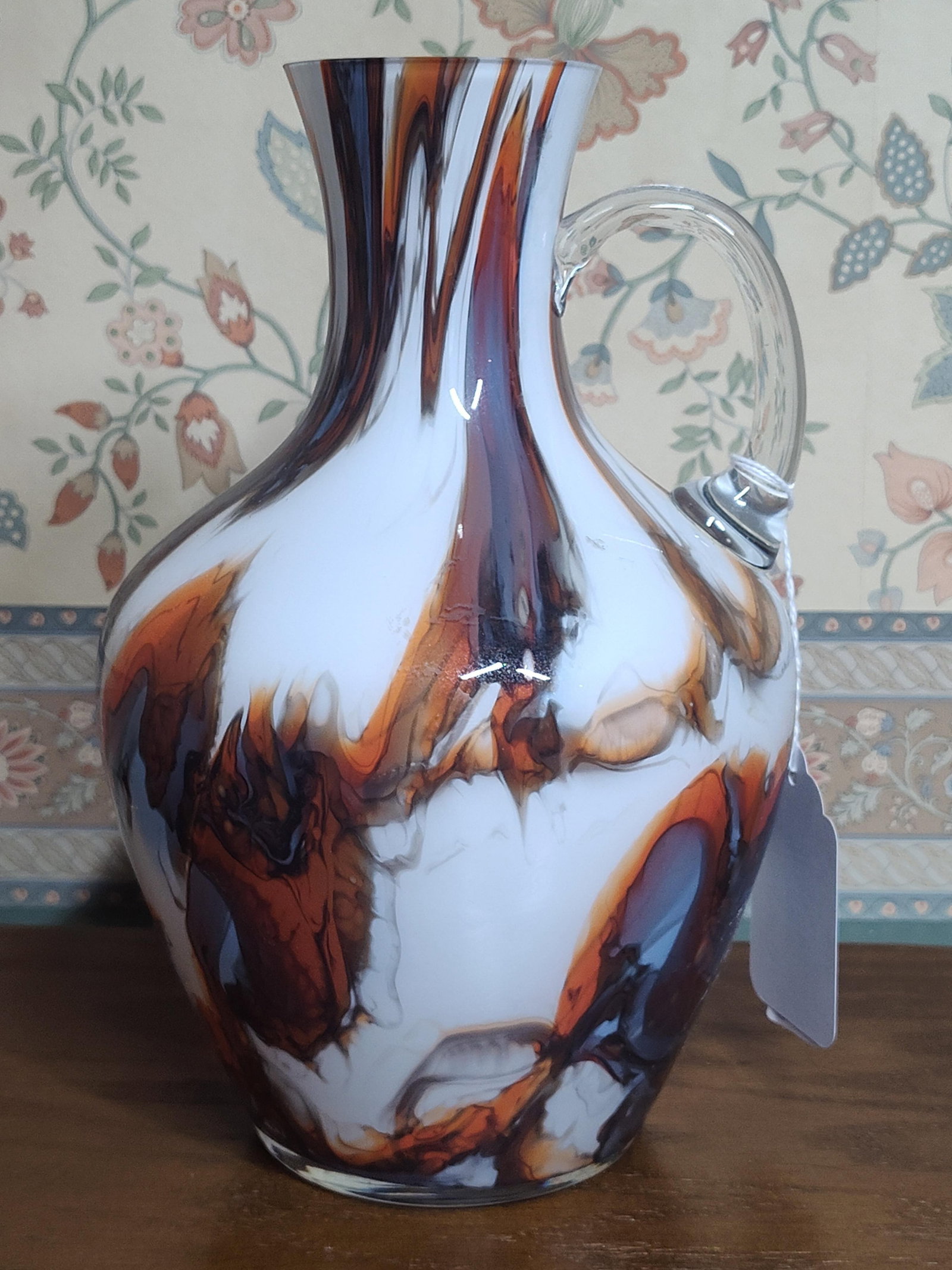 Vetreria Barbieri Attributed Opaline Glass Pitcher: 10 inches tall. A hand-blown cased glass pitcher featuring a bulbous body and a tapered neck with a slightly flared rim. The piece is constructed with an opaque white interior, known as lattimo,