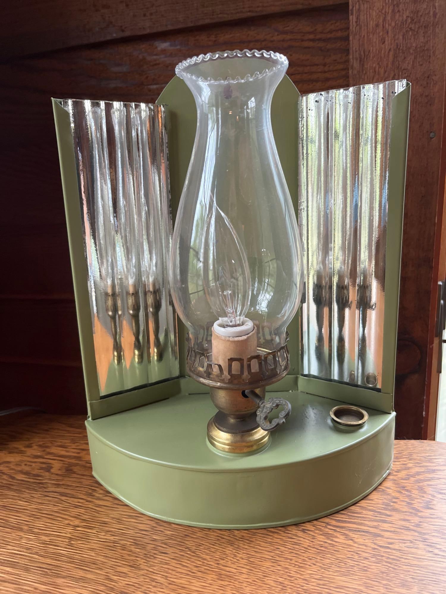 Vtg Colonial Revival Wall Sconce w/ Fluted Glass: This electric wall-mounted sconce is designed in the Colonial Revival style, mimicking a traditional 19th-century kerosene reflector lamp. The fixture features a curved sheet-metal housing finished in
