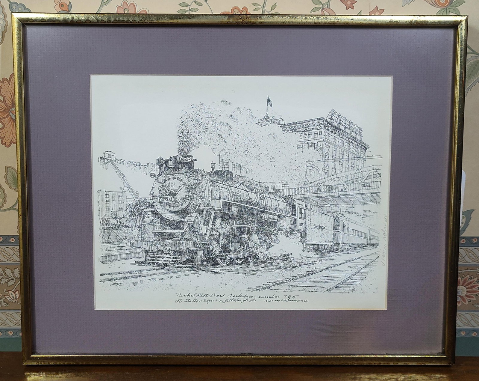 Nevin Robinson Ink Locomotive Drawing: This pen and ink drawing on white wove paper by artist Nevin Robinson depicts the Nickel Plate Road Berkshire, number 765 steam locomotive. The scene is set at Station Square in Pittsburgh,