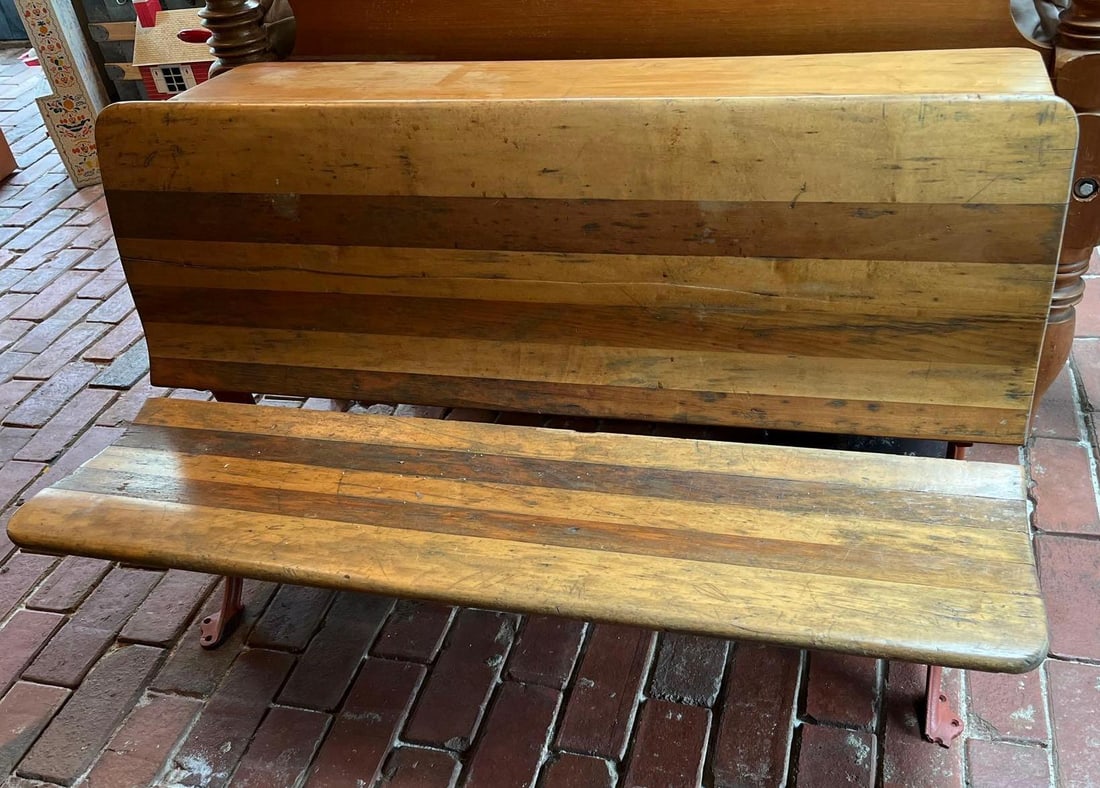 American Iron and Wood Double School Desk & Bench: 42 inches long. An antique American double-occupancy schoolhouse desk and bench combination, likely dating from the late 19th to early 20th century. The unit is constructed with a slatted hardwood des