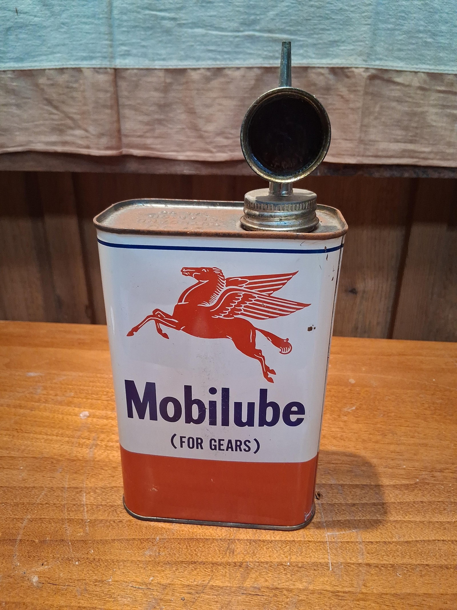 Vtg Mobilube Outboard Gear Oil Tin w/ Spout: This vintage rectangular lithographed tin oil can was produced by the Socony-Vacuum Oil Company for their Mobilube brand. The can features the iconic red Pegasus graphic on the front above the brand