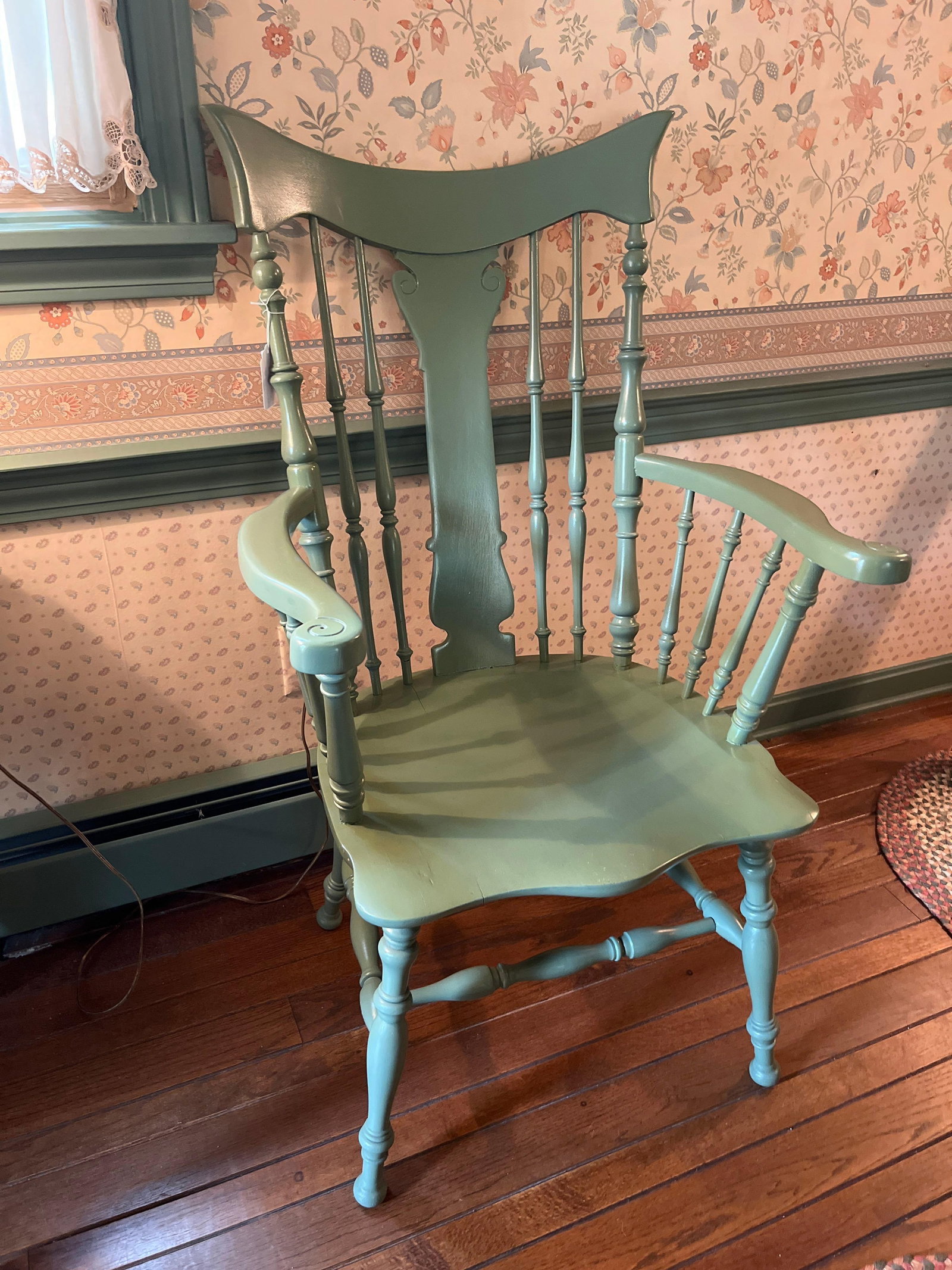 Colonial Revival Windsor Comb-Back Armchair: This is a single Colonial Revival Windsor-style armchair, specifically a comb-back variety, likely dating from the mid-to-late 20th century. The chair is constructed from painted wood and finished in