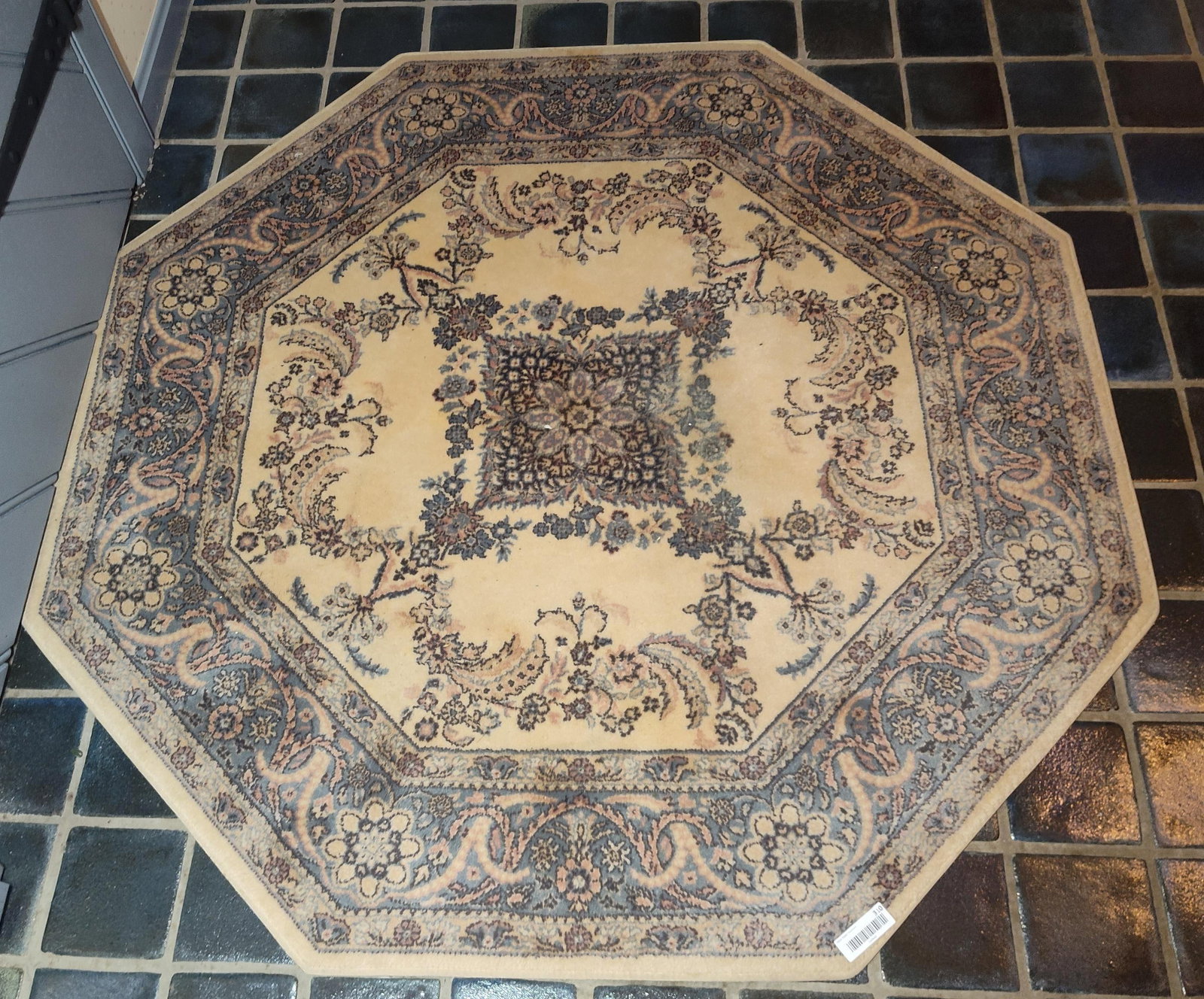 Karastan Karaman Octagonal Oriental Wool Rug: 55x 55. A Karastan power-loomed octagonal rug from the Karaman collection. The rug is constructed with a worsted wool pile and features the manufacturer's patented Locked-In Weave. The design