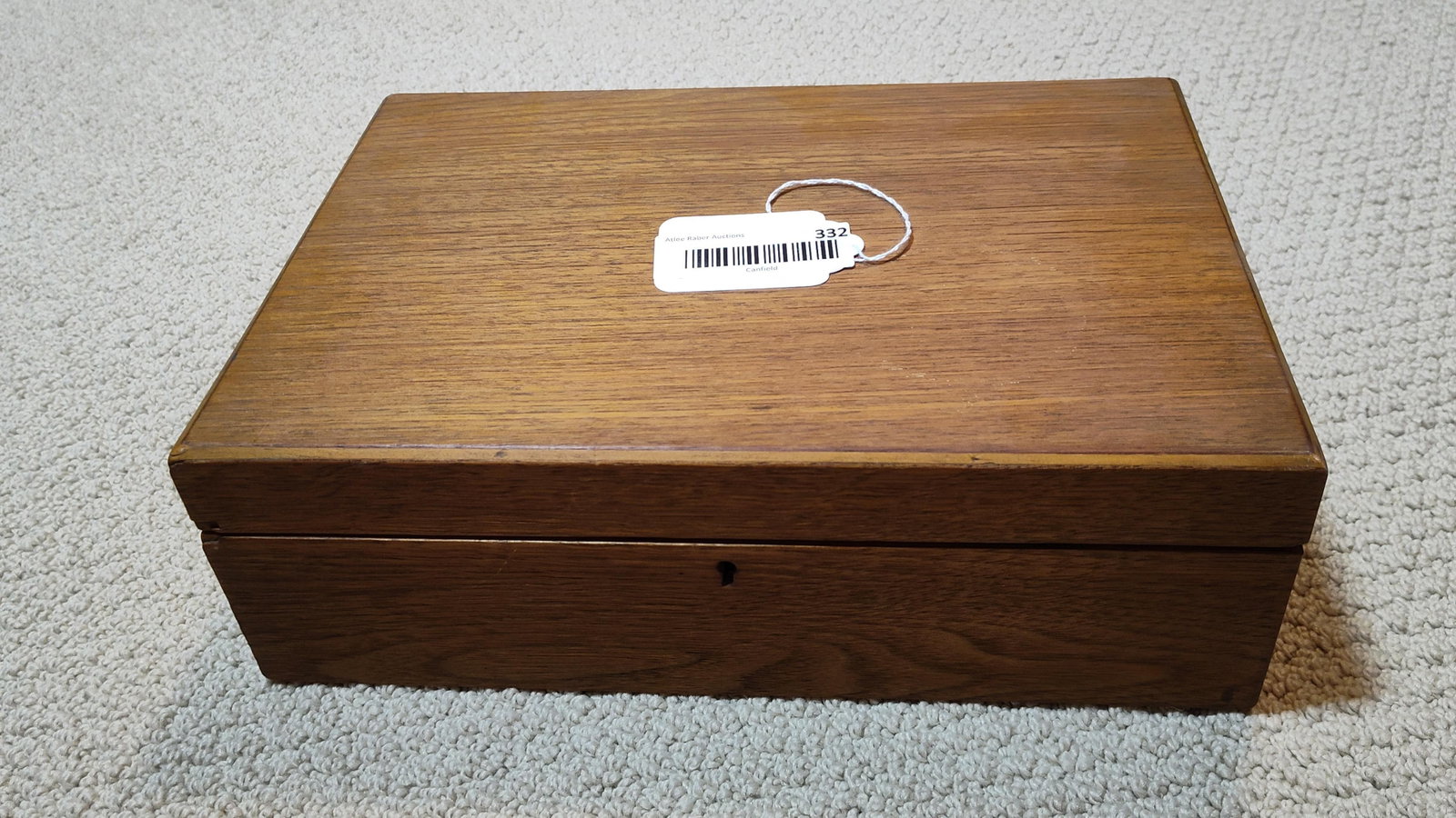 Late 19th/Early 20th C. Wood Writing Slope w/ Keys: A vintage wooden writing slope or lap desk featuring a rectangular form and a hinged lid. The interior is fitted with a slanted writing surface that is hinged to reveal a storage compartment underneat