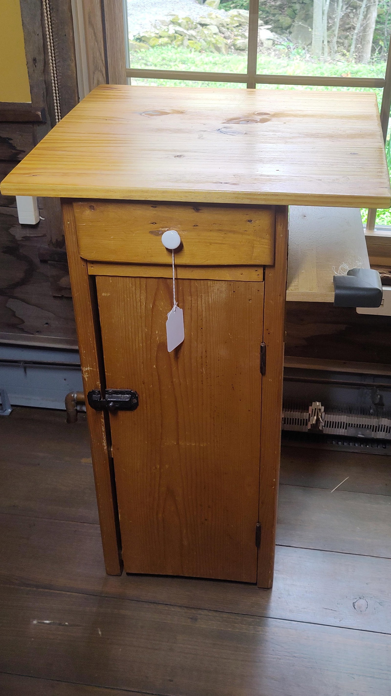 Catskill Craftsmen Pine Kitchen Utility Cabinet: One-piece pine kitchen utility cabinet or workstation by Catskill Craftsmen. The unit is constructed of solid pine with a clear finish that has developed a honey-toned patina. It features a large over