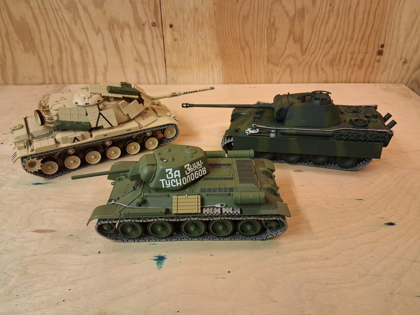 3 Assembled & Painted 1:35 Plastic Military Tanks: A collection of three assembled and painted plastic model kits of armored fighting vehicles, likely in 1:35 scale. The collection includes a U.S. Marine Corps M60A1 Main Battle Tank featuring