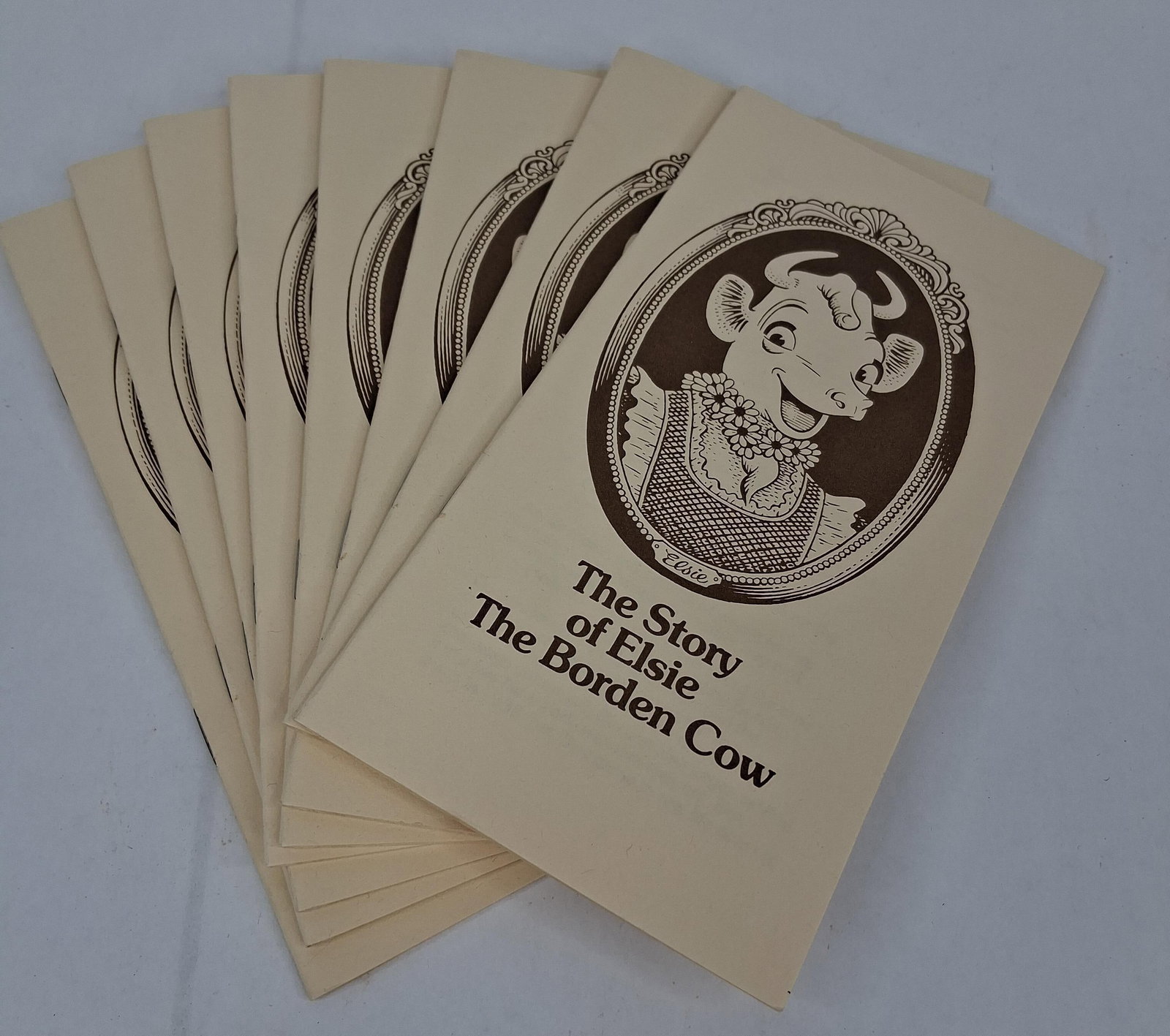 Borden, Inc. Story of Elsie the Borden Cow c. 1973: A collection of promotional advertising pamphlets titled The Story of Elsie The Borden Cow, published by Borden, Inc. Each staple-bound softcover booklet is printed on cream-colored paper using