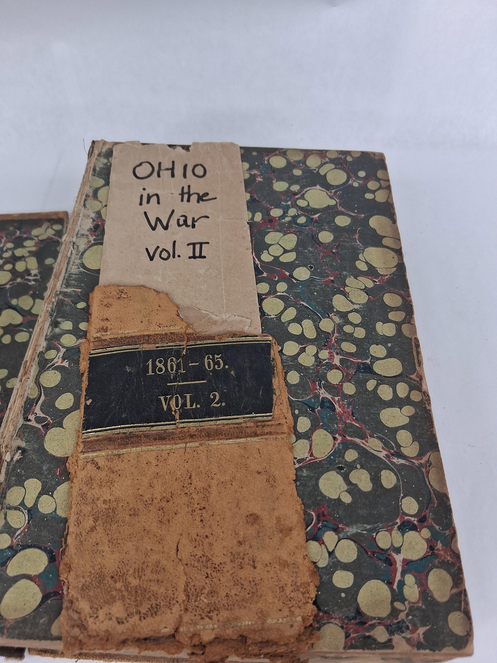 Whitelaw Reid, Ohio in the War, Vol. II, 1868: This octavo volume is the second installment of Whitelaw Reid's comprehensive history of Ohio's participation in the American Civil War, specifically detailing the histories and rosters of the Ohio