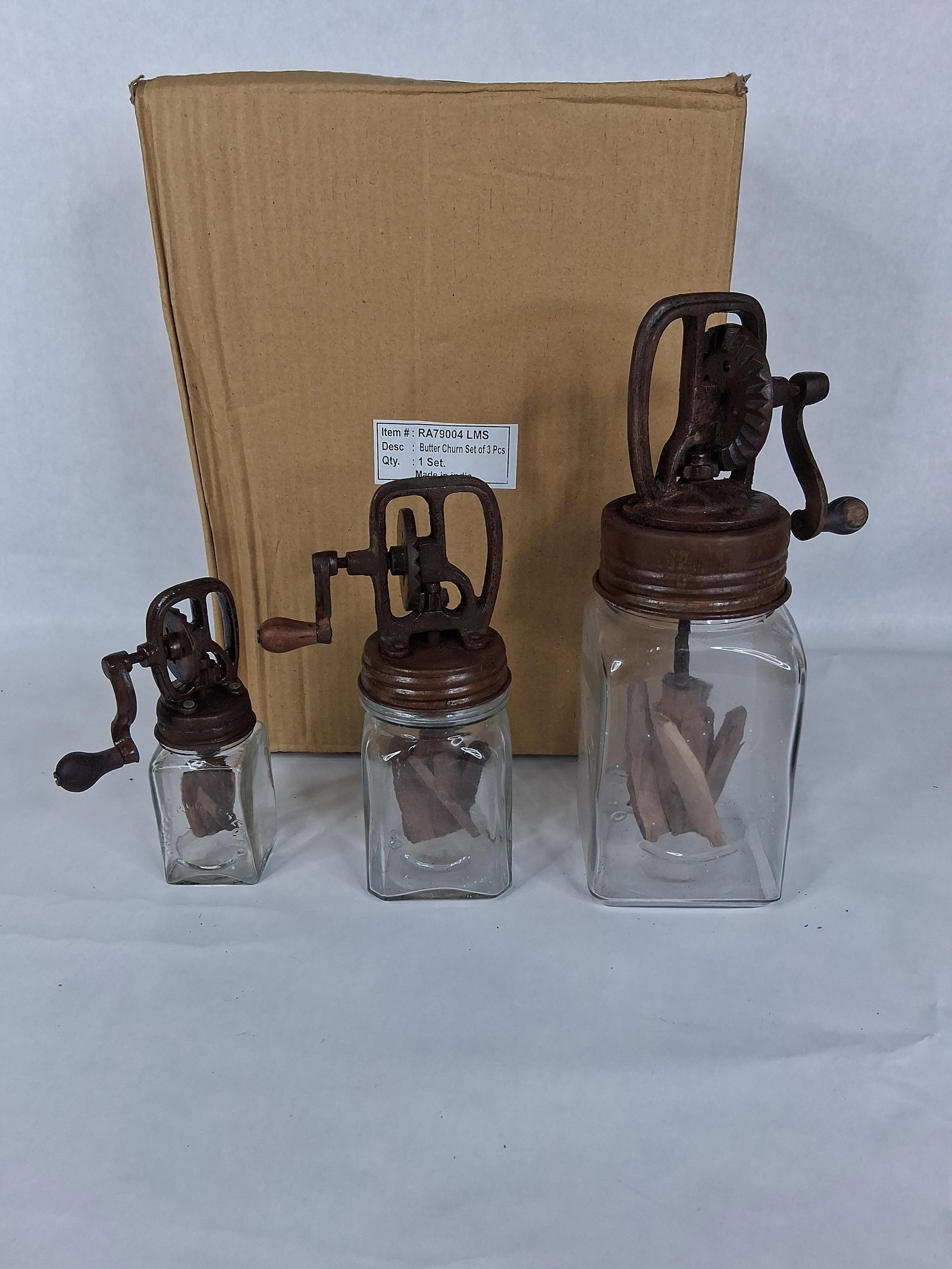 Set 3 Dazey Style Butter Churns: A graduated set of three contemporary reproduction manual hand-crank butter churns, modeled after early 20th-century designs by the Dazey Churn and Manufacturing Company. Each unit consists of a squar