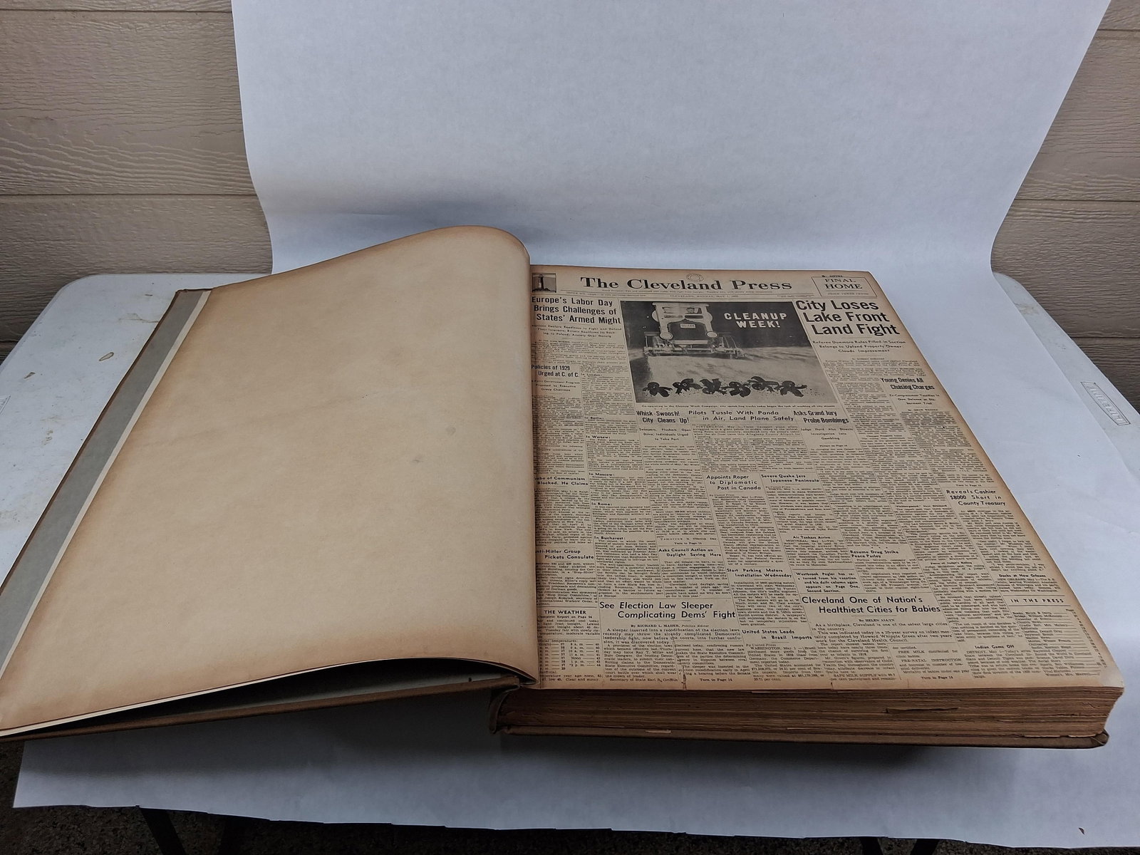 The Cleveland Press, Bound Daily Issues, May 1939: 17x24This lot consists of a bound folio volume of The Cleveland Press newspapers, containing the complete daily run for the month of May 1939. The archive is bound in a heavy brown cloth library bindi