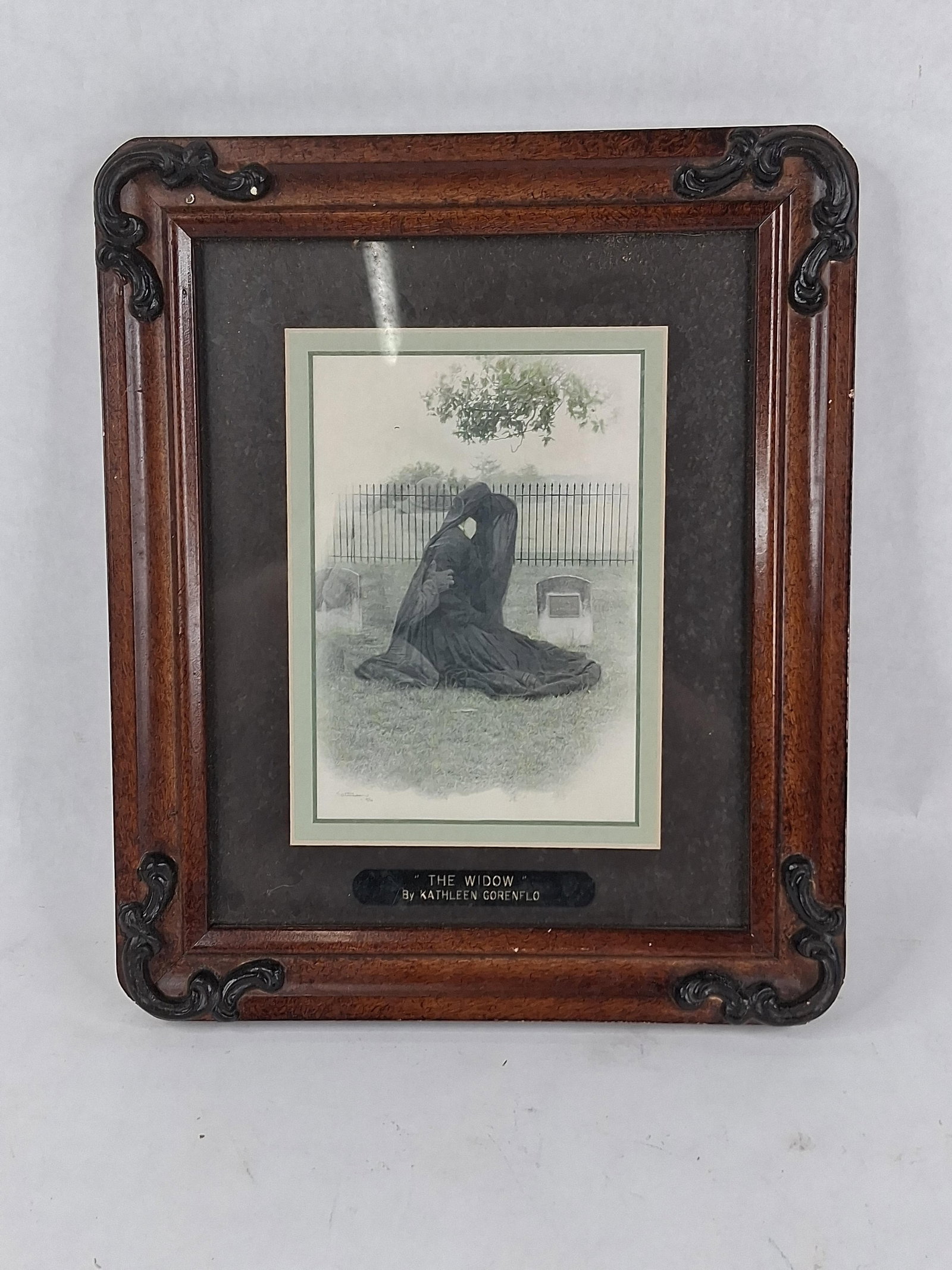 Lattimer, The Widow, Framed Print: 10x12 This framed print is a reproduction of a work titled The Widow, which is attributed to Kathleen Gorenflo on the identification plaque affixed to the matting. The image itself is signed and