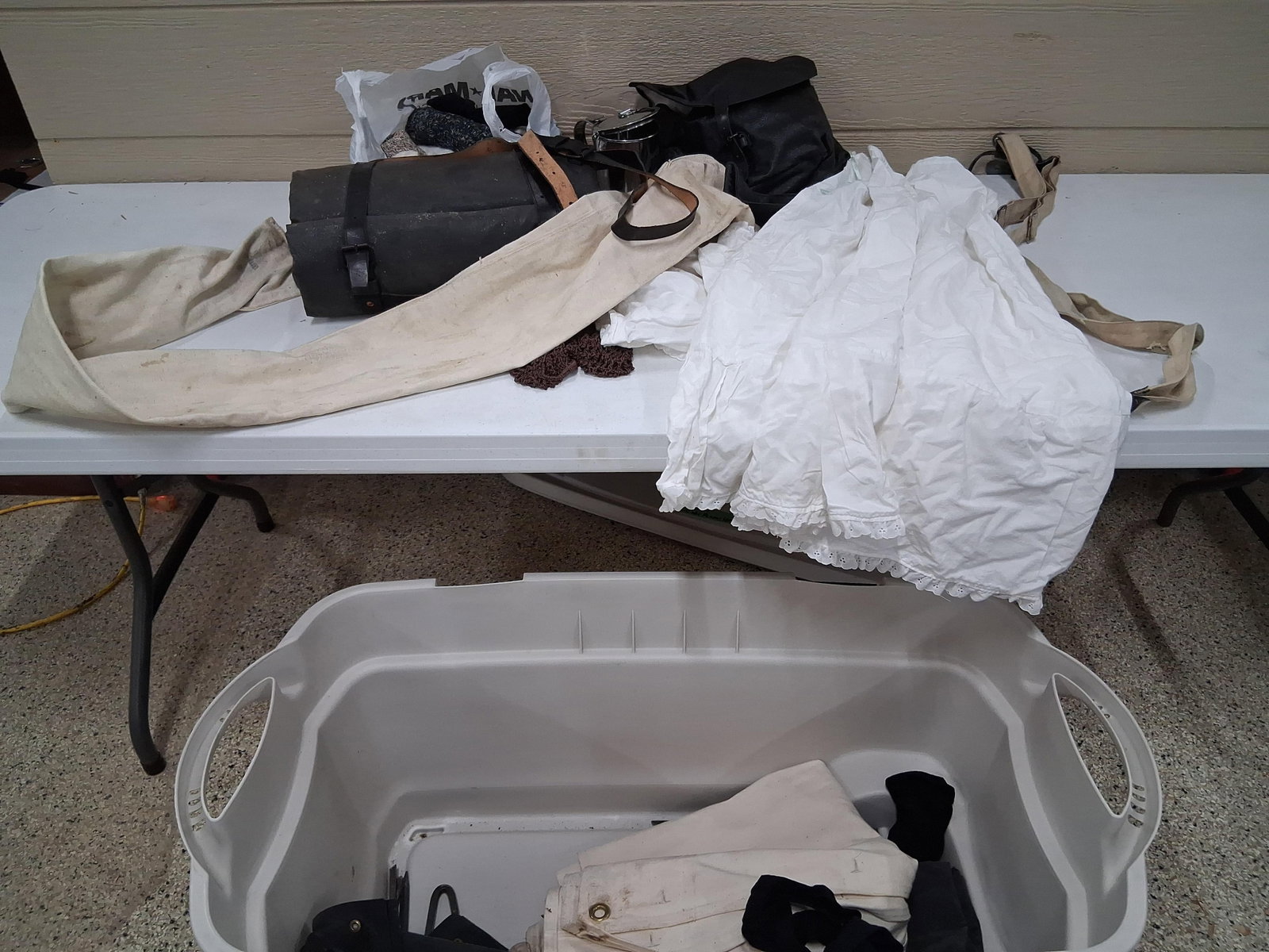 Civil War Reenactor Field Gear & Camp Equipment: An assortment of modern reproduction equipment and accessories modeled after mid-19th-century American military and civilian patterns. The field gear includes a double-bag knapsack constructed of