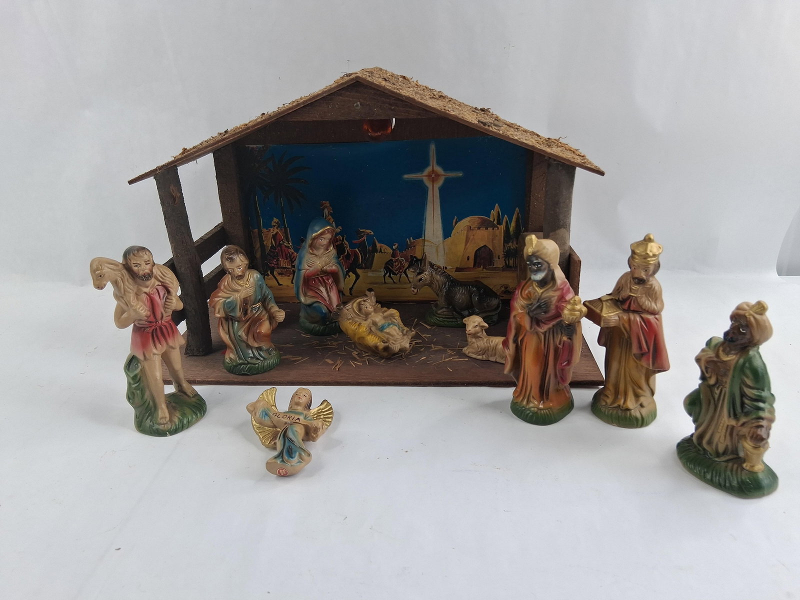 Sears Roebuck & Co. 15pc Papier-Mache Nativity Set: This nativity set was manufactured in Japan and sold through Sears, Roebuck and Co. The collection features hand-painted figures constructed from papier-mache composition. The set includes a wooden