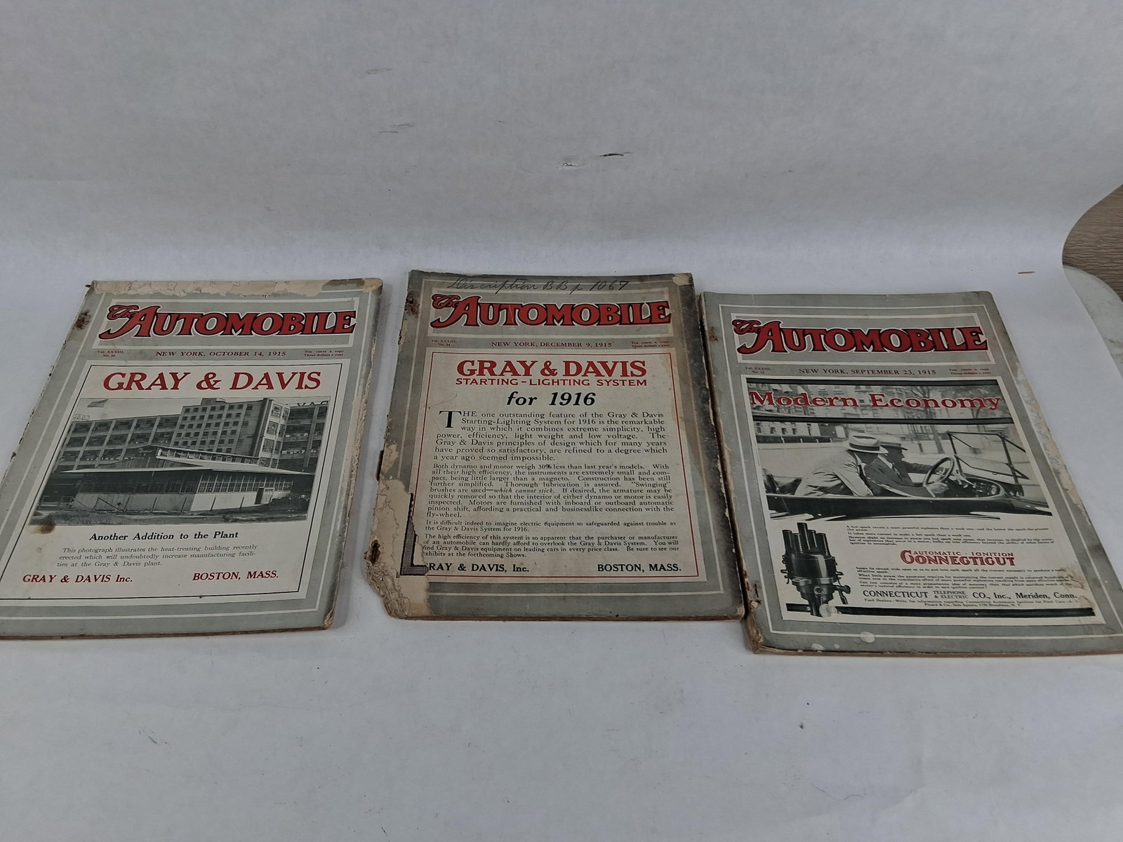 The Automobile, 3 Issues, Class Journal Co., 1915: A trio of softcover issues of The Automobile, a weekly trade magazine published in New York. The collection includes Volume XXXIII, No. 13 (September 23, 1915), Volume XXXIII, No. 16 (October 14,
