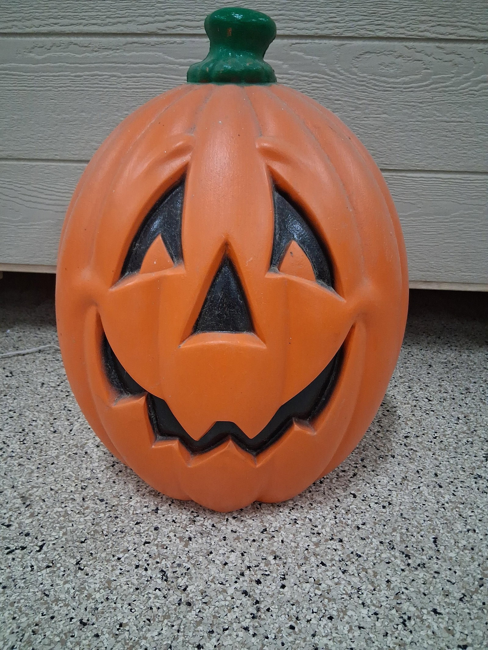 Kmart Halloween Jack-O-Lantern Blow Mold Light: 24 in tall Distributed by Kmart Corporation and attributed to General Foam Plastics, this is a classic seasonal blow-molded plastic decoration in the form of a jack-o-lantern. The pumpkin features a