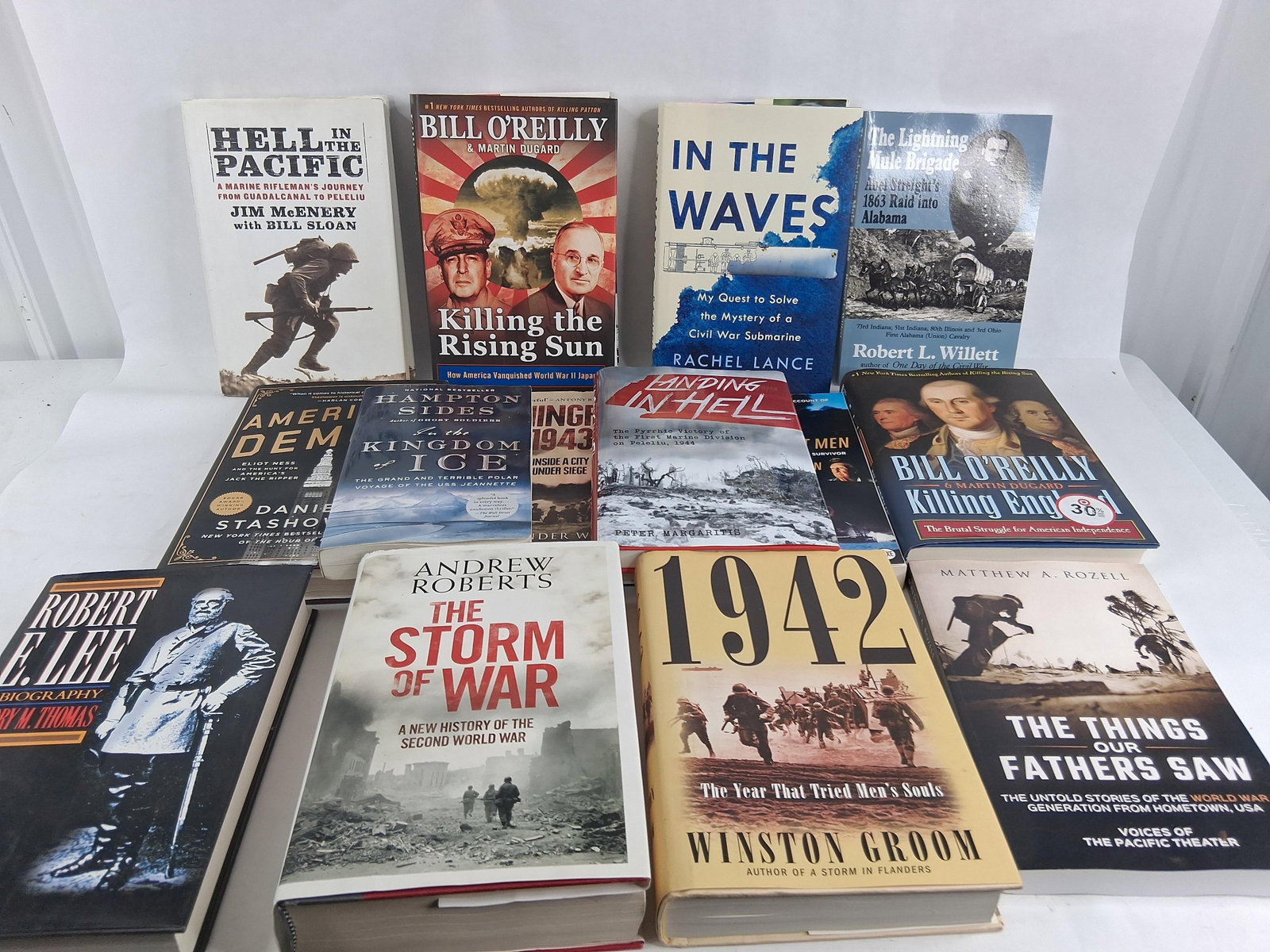 Historical & Military Non-Fiction Books w/ DJ: An assortment of non-fiction historical works, primarily focusing on military history, biography, and maritime exploration. The collection includes a mix of hardcover editions with original dust