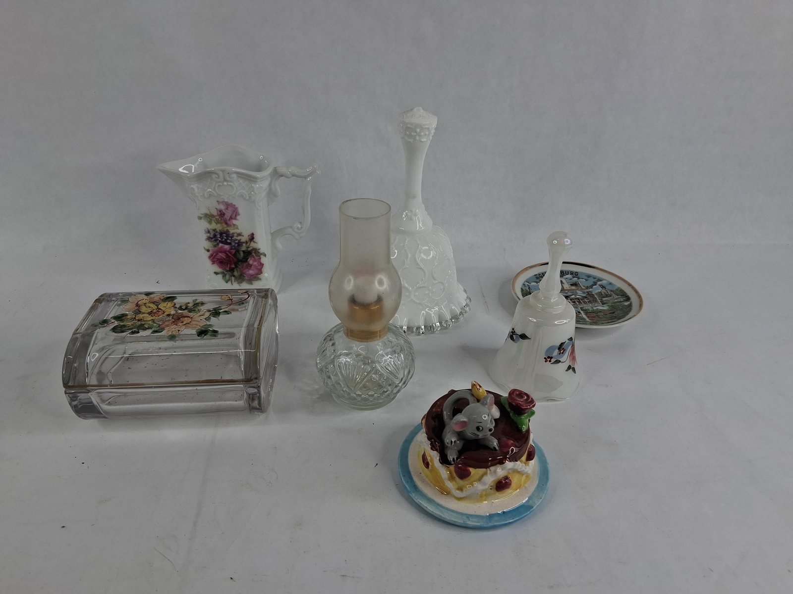 Set 7 Fenton & Faust Heirlooms Glass & Ceramics: This collection consists of seven assorted decorative glass and ceramic items. It features a Fenton iridescent milk glass bell with a ruffled rim, hand-painted with pink roses and a central heart,