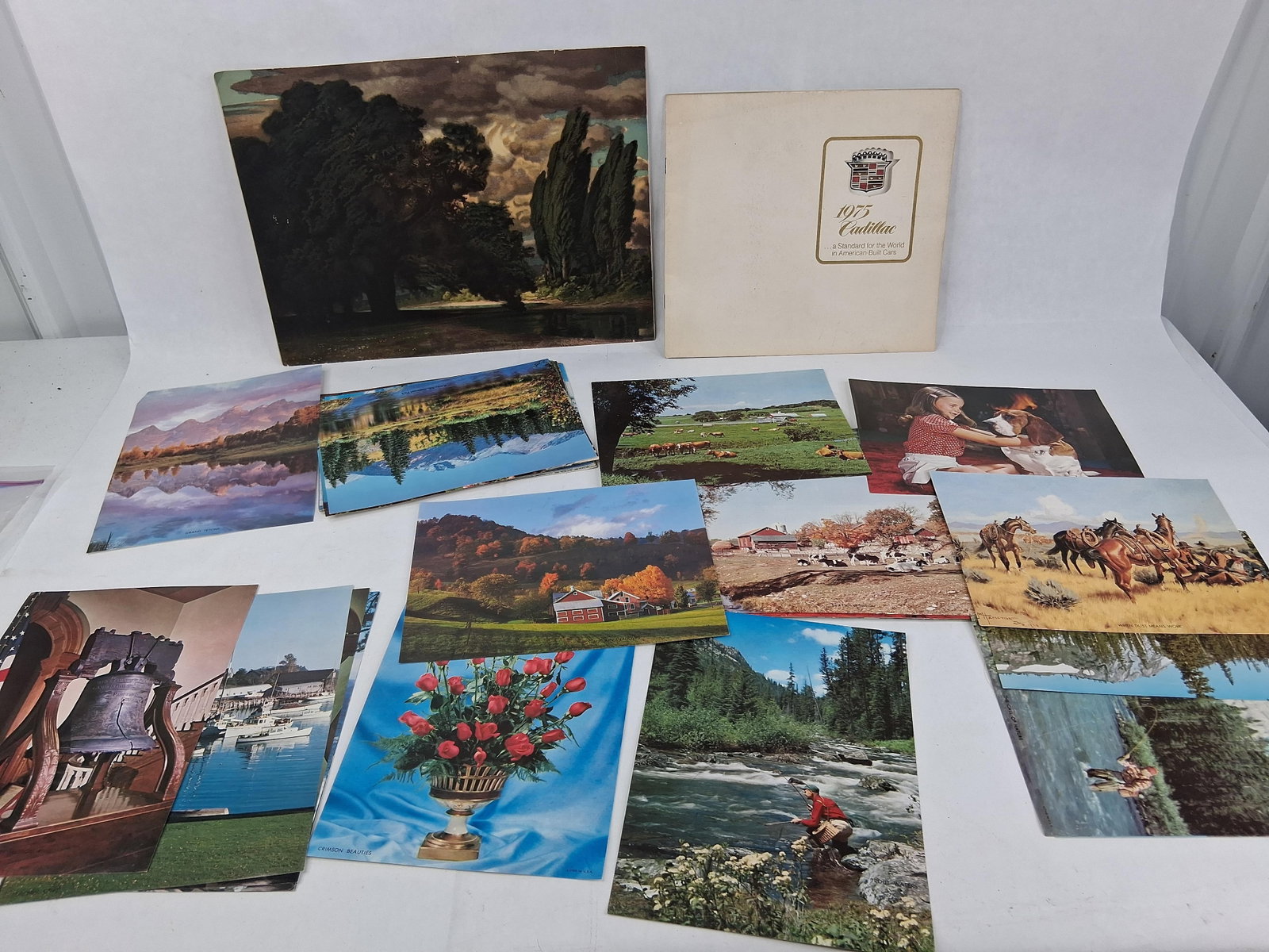 1975 Cadillac Brochure & Ephemera Prints: 80 lithos 6.25x8.25 An assortment of mid-20th-century paper ephemera consisting of a luxury automotive sales brochure and various color prints. The collection features a 1975 Cadillac promotional