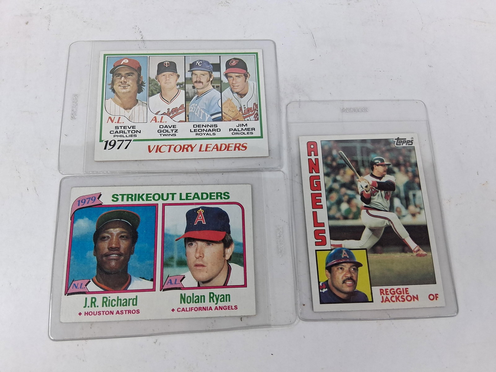 Topps Baseball Cards: Ryan, Jackson & Carlton: This collection consists of three baseball cards produced by Topps. The first item is a 1978 Topps 1977 Victory Leaders card, number 205, which features pitchers Steve Carlton, Dave Goltz, Dennis