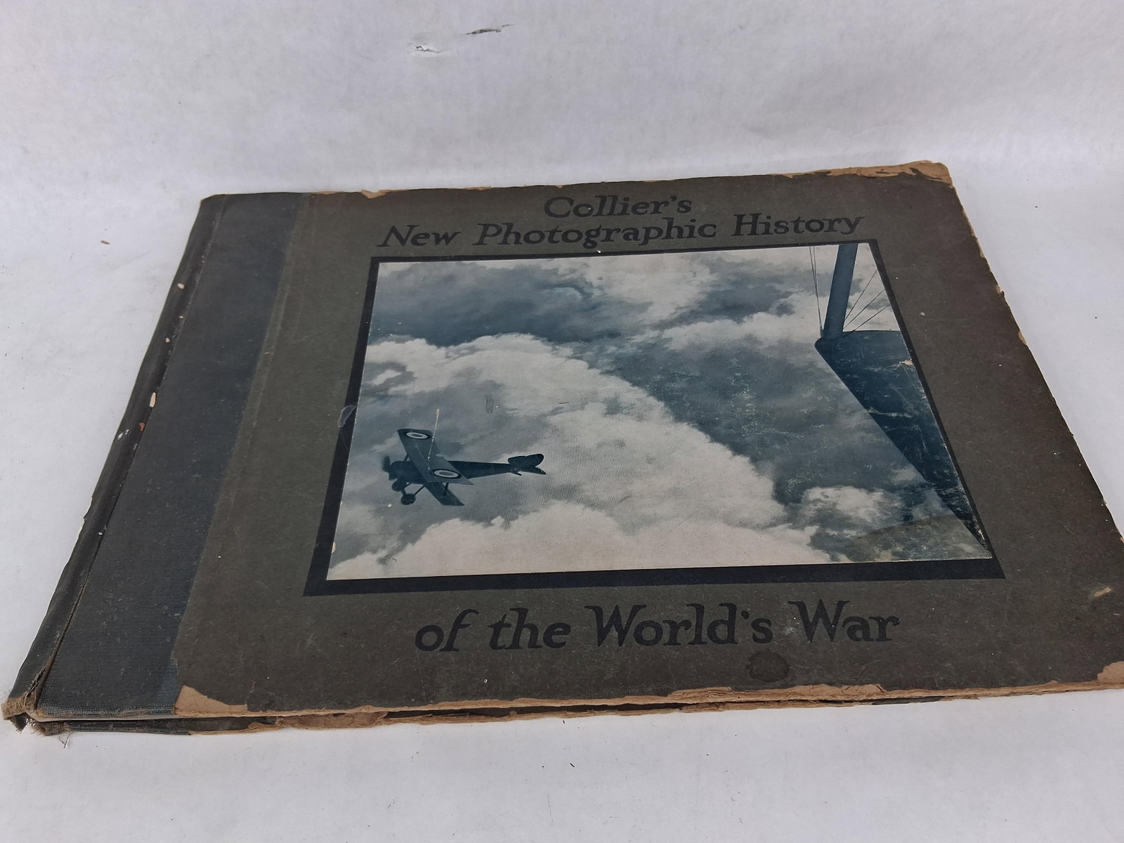 Reynolds, Francis J. and C.W. Taylor. Collier's New Photographic History of the World's War. P.F.: This large landscape-format folio is titled Collier's New Photographic History of the World's War, published in 1918. The work was collected and arranged by Francis J. Reynolds and C.W. Taylor and