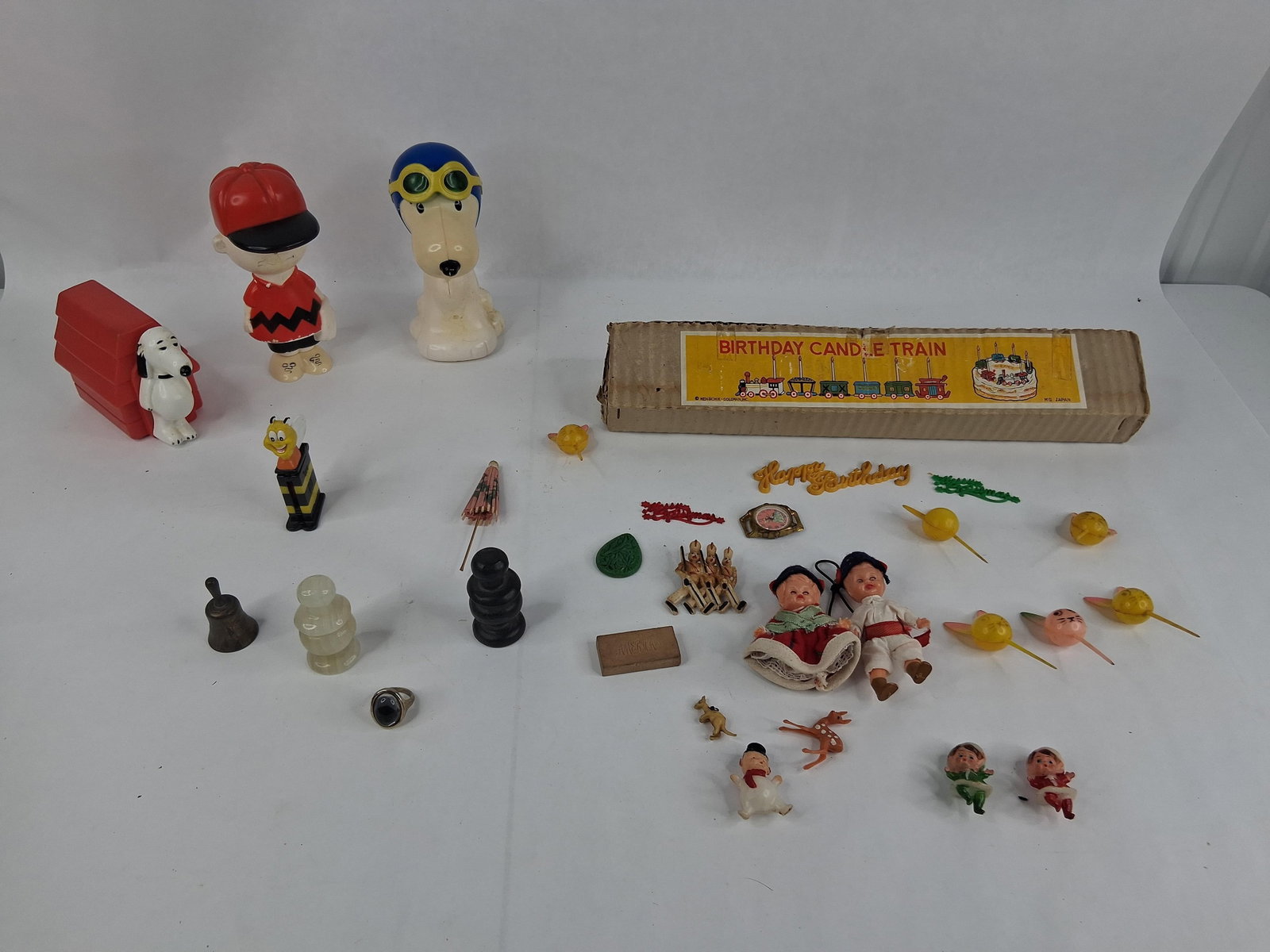 Menschik-Goldman Train, Peanuts & Holiday Toys: This collection features an eclectic variety of toys, holiday novelties, and miniature collectibles. Included is a set of three molded plastic Peanuts figures: Charlie Brown wearing a red baseball