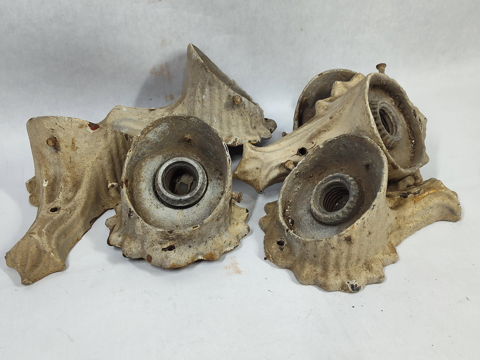 Set 5 Industrial Scalloped Cast Metal Sconce Bases: A set of five vintage wall-mounted light fixture bases, likely originally utilized as theater aisle lights or decorative industrial sconces. Each unit is constructed from cast metal and features a