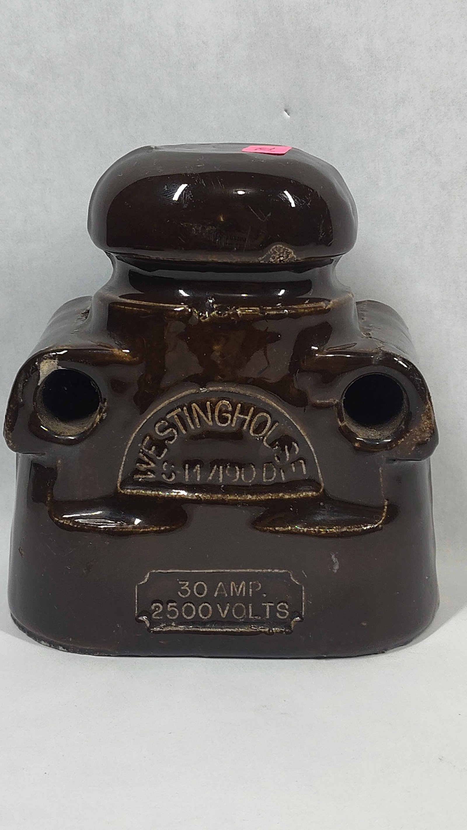 Vtg Westinghouse Brown Porc. 30A 2500V Fuse Cutout: This is a vintage industrial primary fuse cutout manufactured by Westinghouse, specifically used as an electrical insulator block for high-voltage power lines. The item is made of heavy brown glazed
