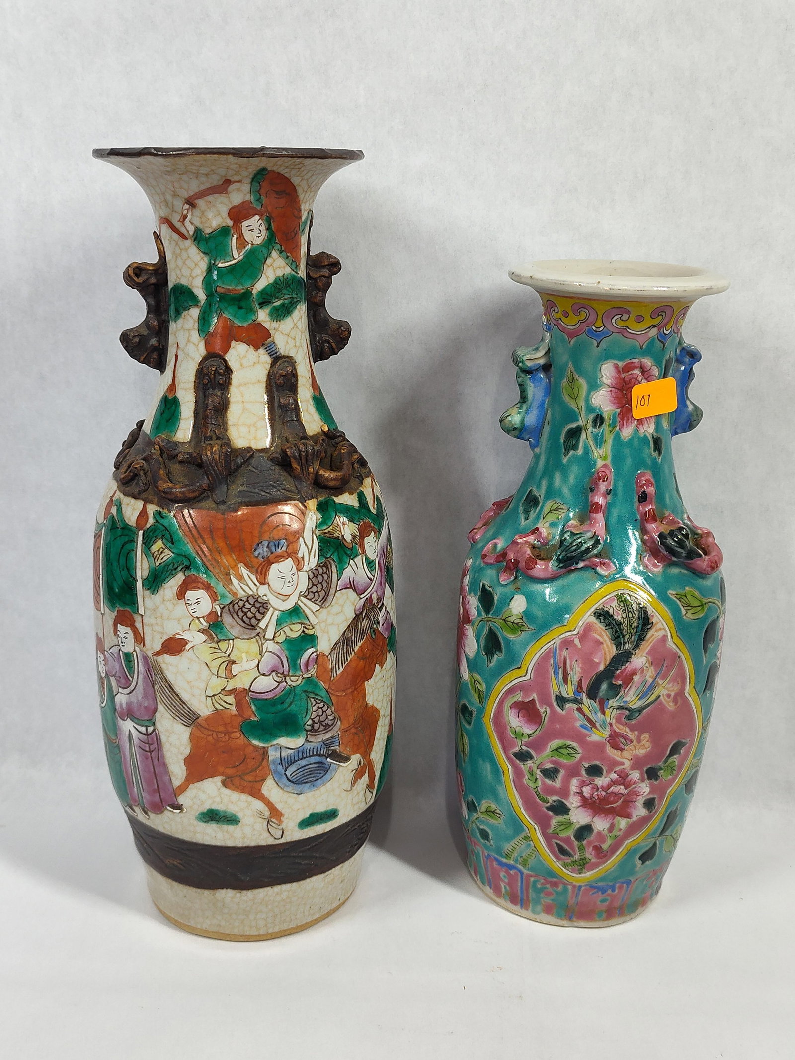 2 Chinese Porc. Famille Verte & Famille Rose Vases: This lot includes two Chinese porcelain vases of differing styles and periods. The first is a crackle-glaze porcelain vase decorated in famille verte enamels. The body depicts a martial scene with fig