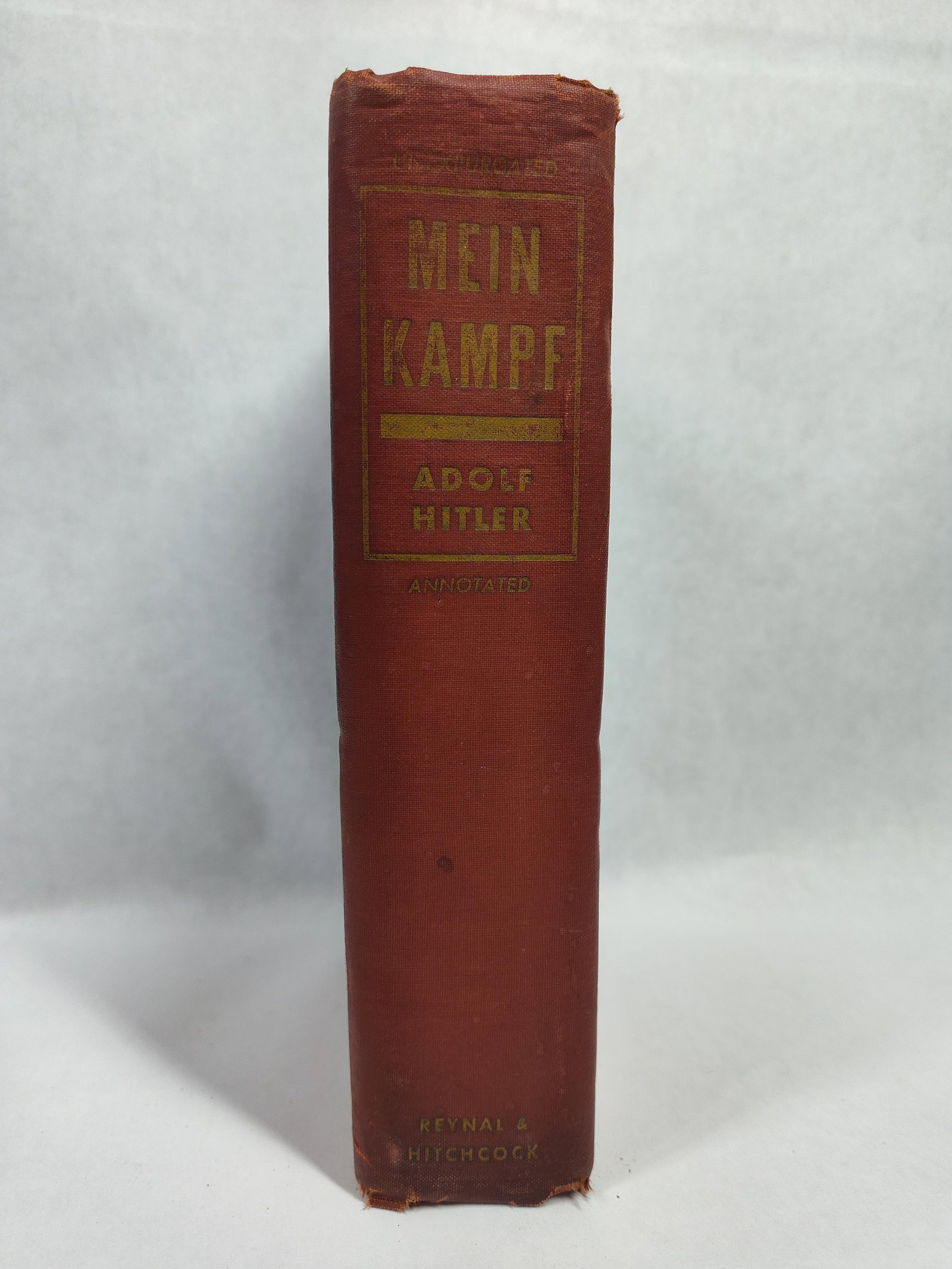 Hitler, Mein Kampf, Annotated Edition, 1939: This octavo volume is the 1939 Reynal & Hitchcock edition of Adolf Hitler's Mein Kampf. It is described on the title page as the complete and unabridged version, fully annotated by a committee of ten 