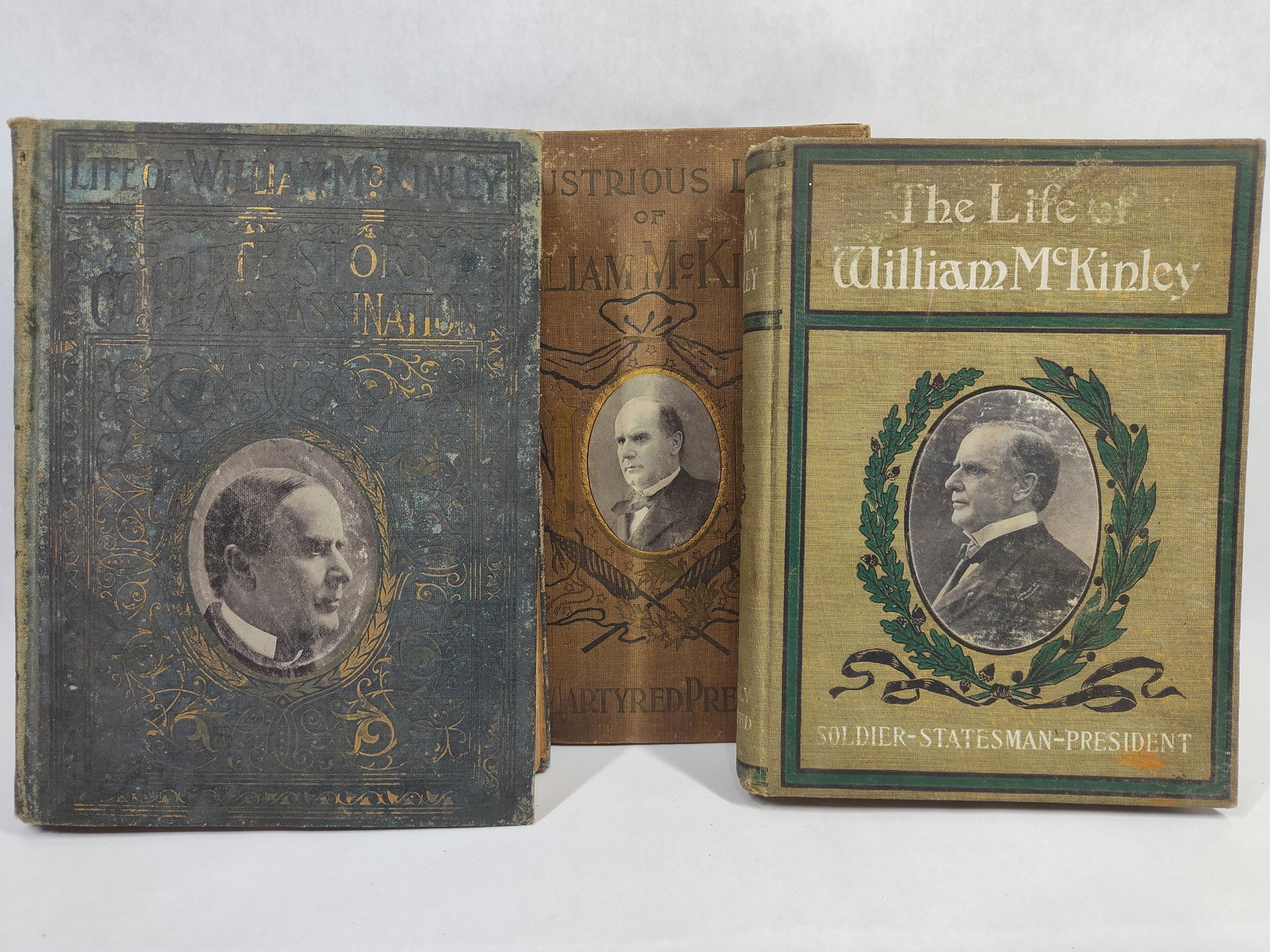 3 William McKinley Commemorative Biographies, 1901: A trio of contemporary hardcover volumes concerning the life and death of U.S. President William McKinley, published in the immediate aftermath of his assassination in 1901. The first volume is the