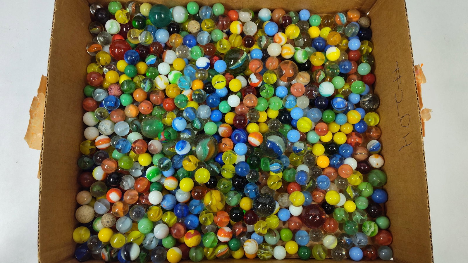 Vtg Glass & Clay Marbles w/ Uranium Glass: A large collection of assorted marbles composed of glass and potentially clay, featuring a wide variety of sizes and decorative styles. The assortment includes cat's eye, multi-colored swirl, opaque,