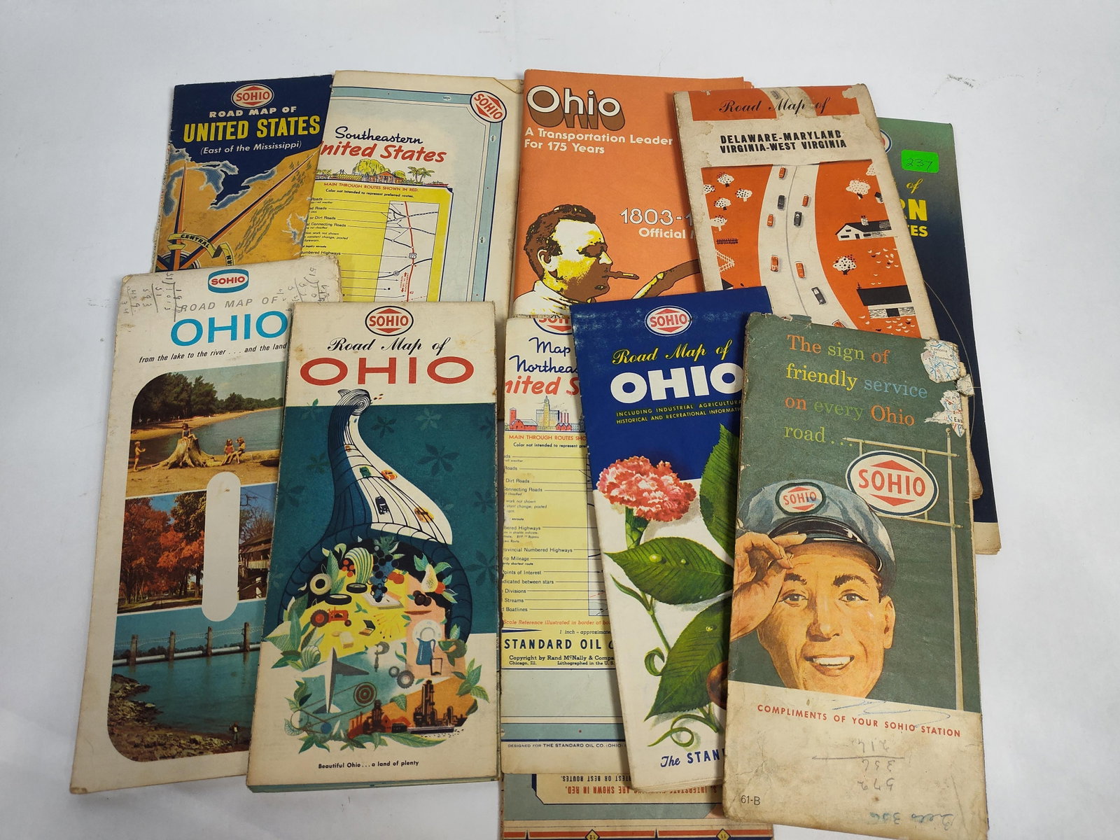 10 Vtg Sohio Standard Oil of Ohio Road Maps: A collection of 10 vintage paper road maps issued by Sohio (The Standard Oil Company of Ohio), primarily dating from the mid-20th century. The group includes several variations of the Ohio state road 