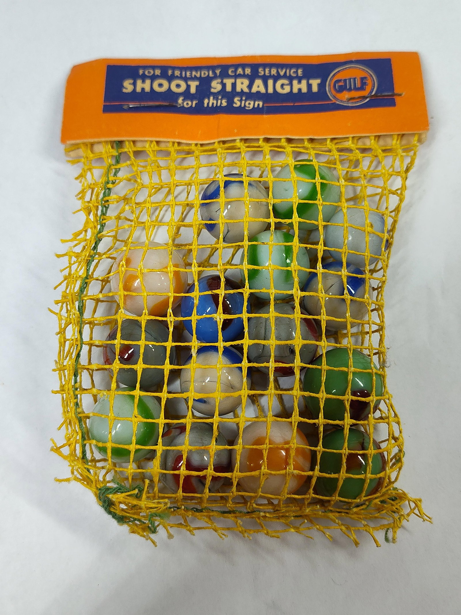 Vtg Gulf Oil Promotional Glass Marbles in Mesh Bag (1 of 2)
